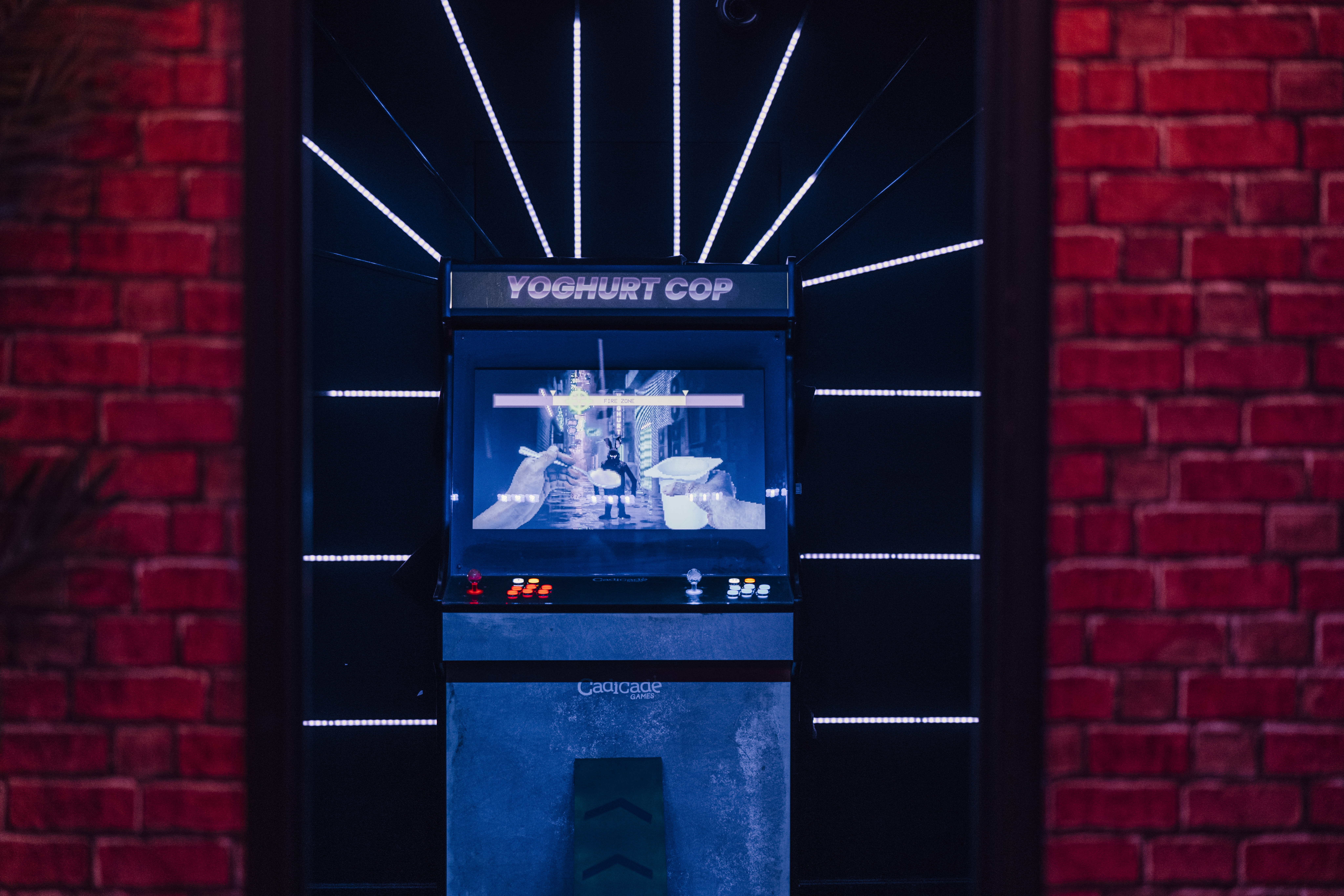 Retro arcade game "Yogurt Cop" at Caddies Southend for engaging event entertainment.