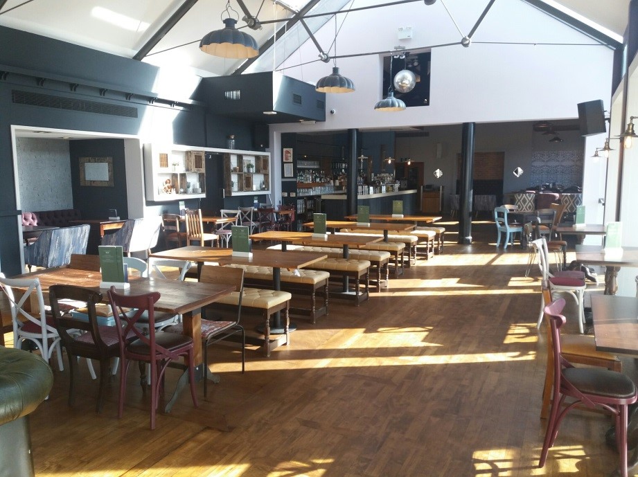 Spacious Upstairs Bar & Function Room for events in Pitcher & Piano York, modern decor.