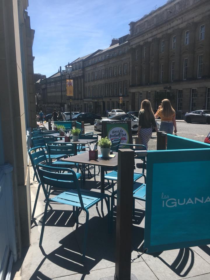 Vibrant outdoor seating at Las Iguanas Newcastle for casual meetings and networking events. - Banner