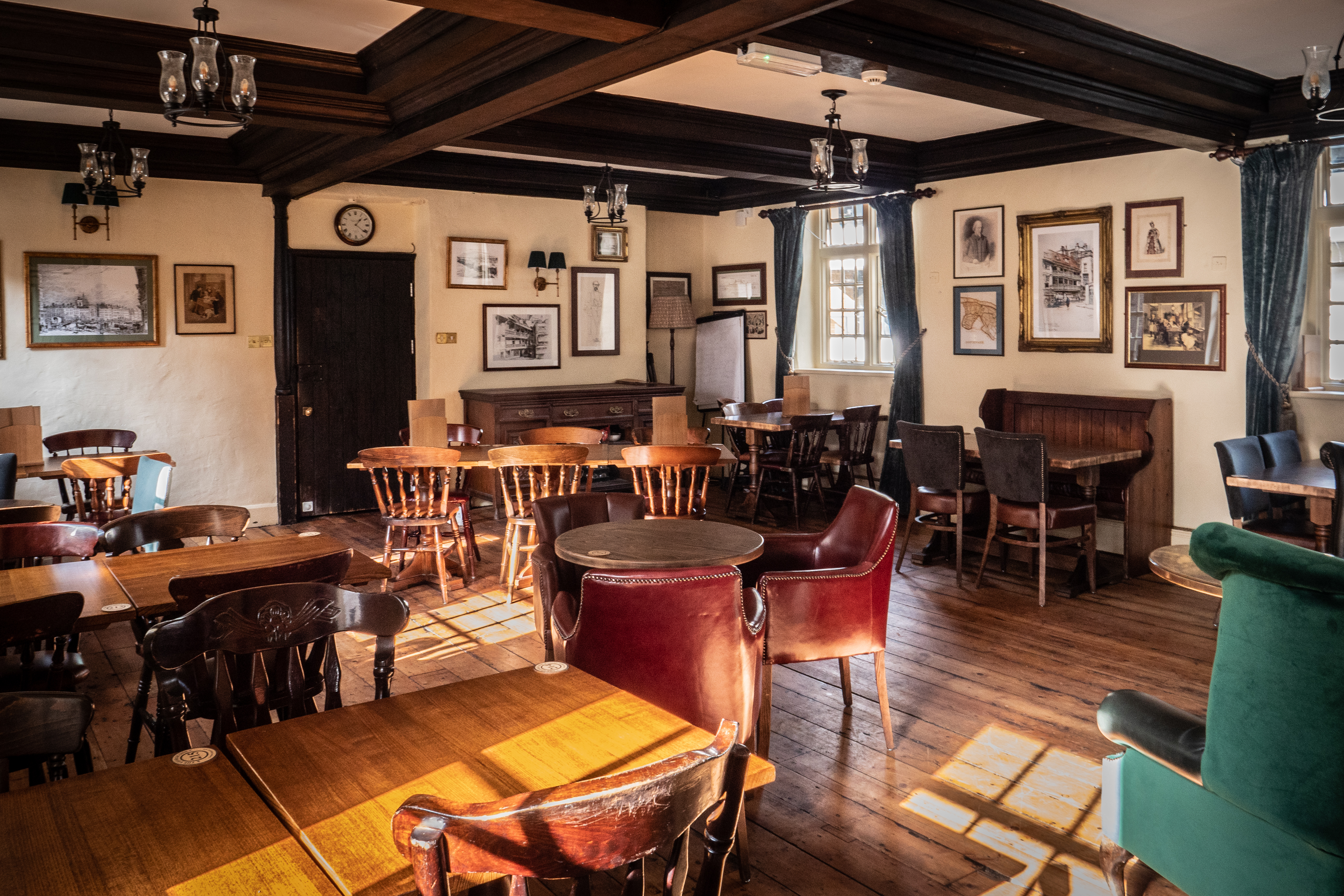 Cozy venue at Greene King - The George Inn, ideal for meetings and small events.