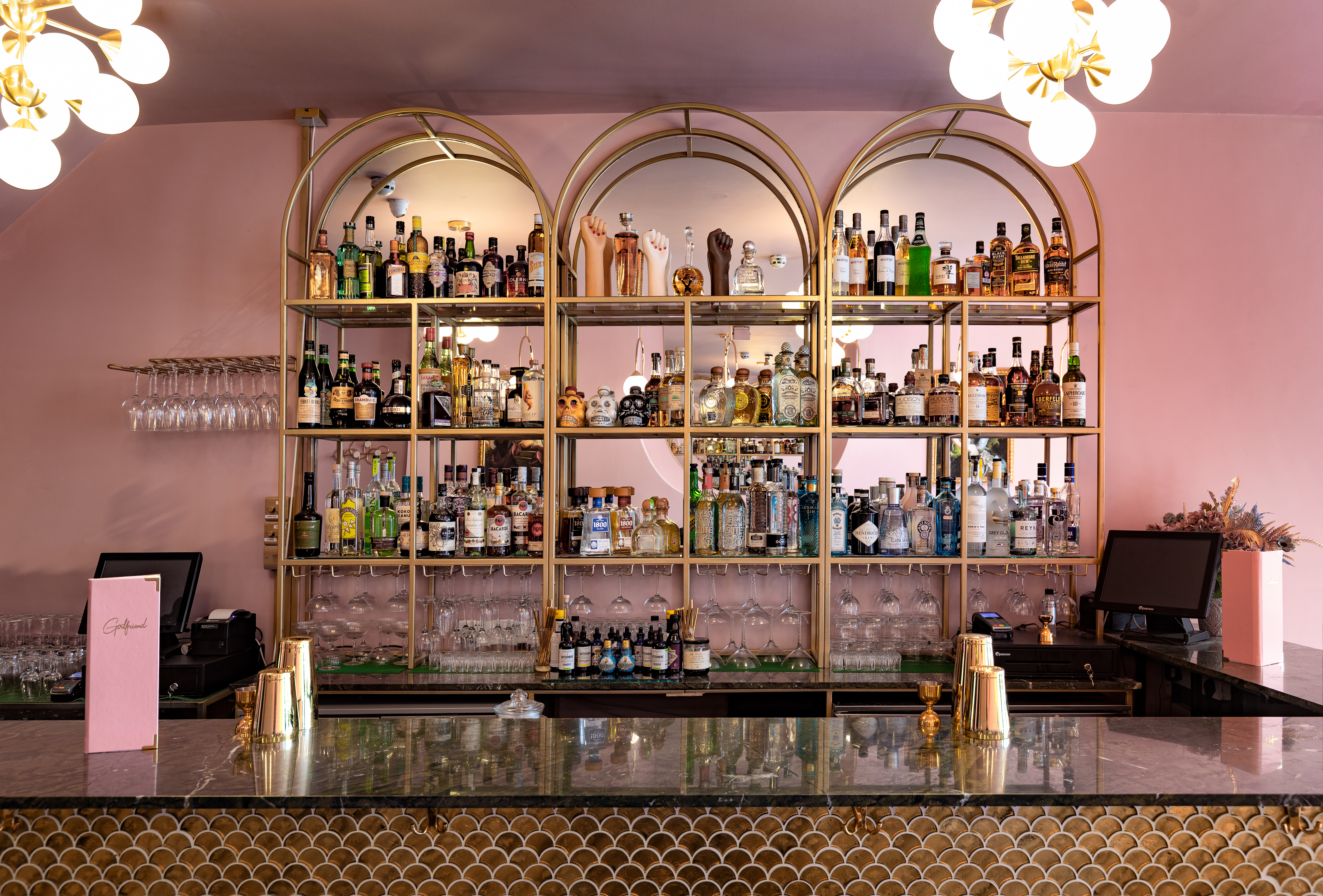 Stylish bar setup with gold accents for networking events in Girlfriend Clapham.