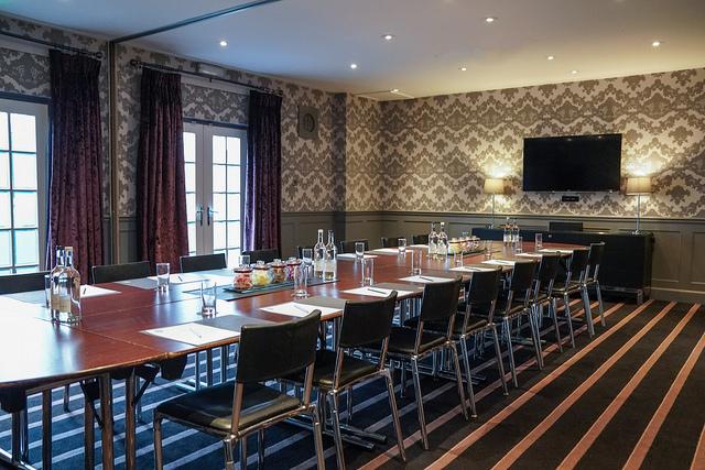 MAL THREE meeting room in Malmaison Edinburgh, featuring a polished table for professional events.