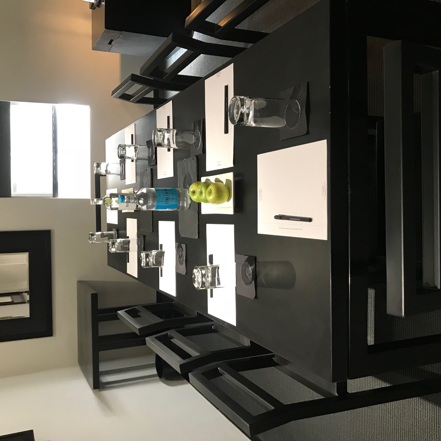 Meeting Room 26 at La Suite West Hotel with sleek table setup for professional events.