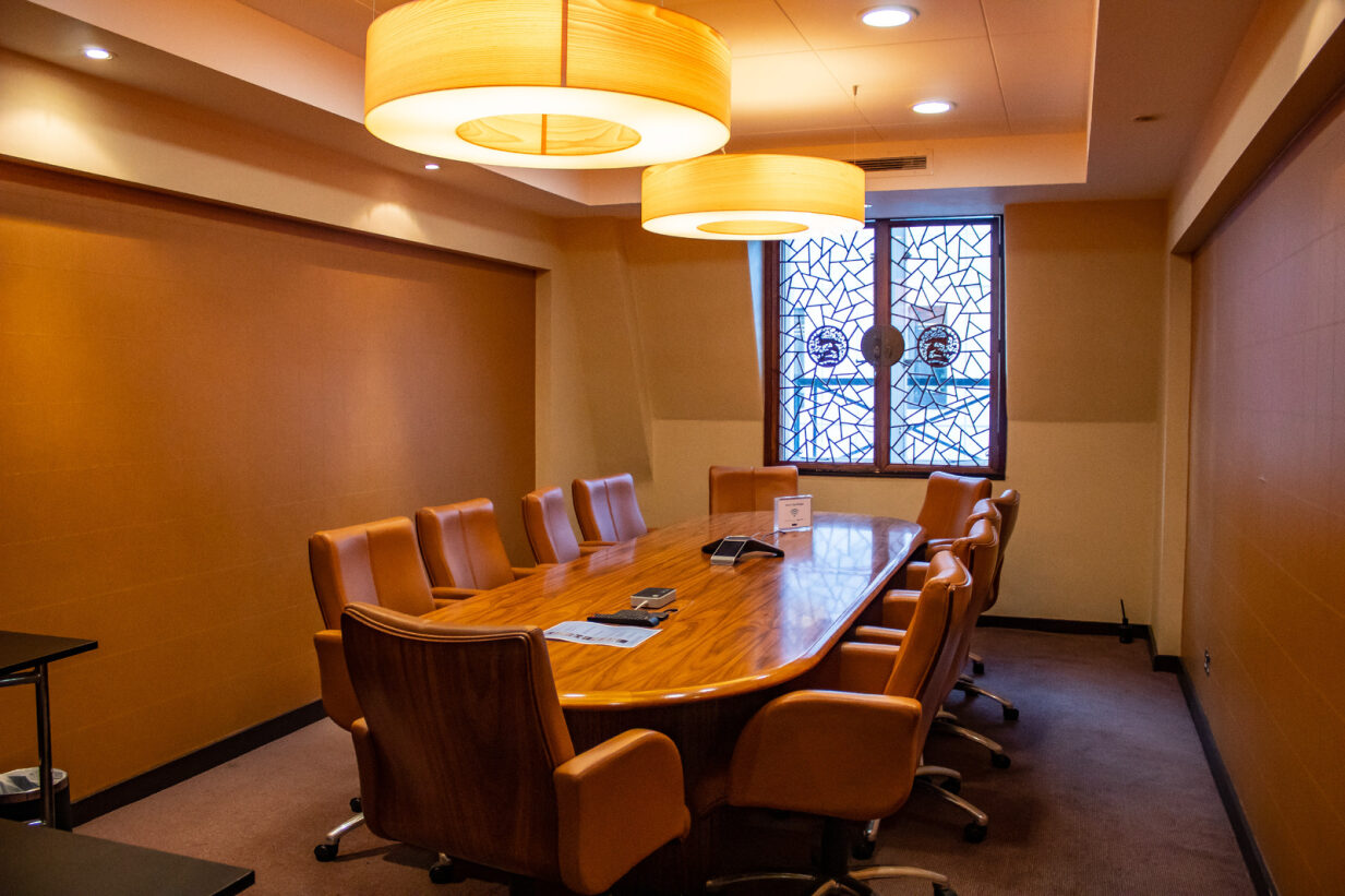 CUHK Room at 1 Wimpole Street, modern meeting space with wooden table for professional events.