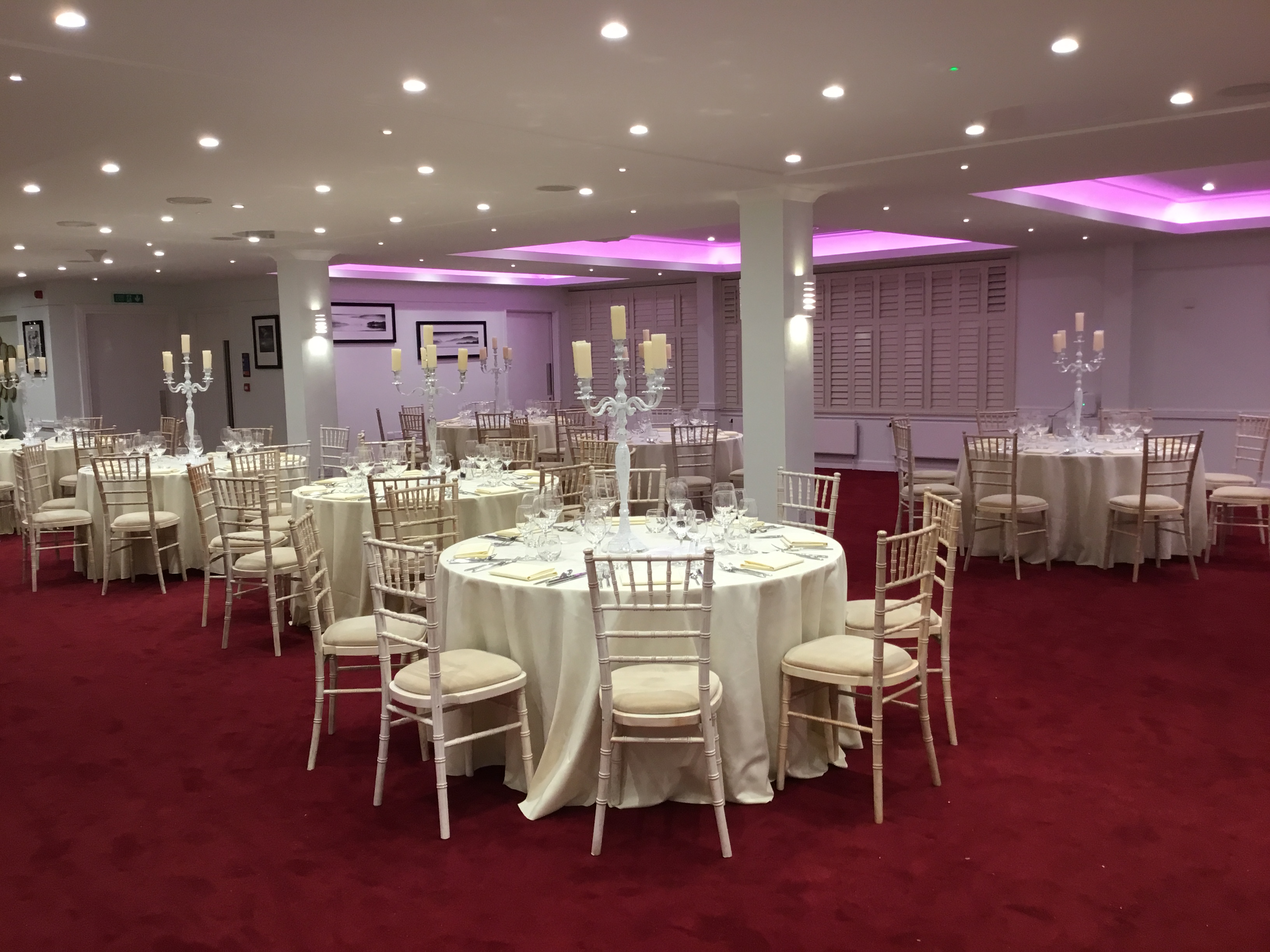 Elegant event space with round tables and candelabras at No.11 Cavendish Square.