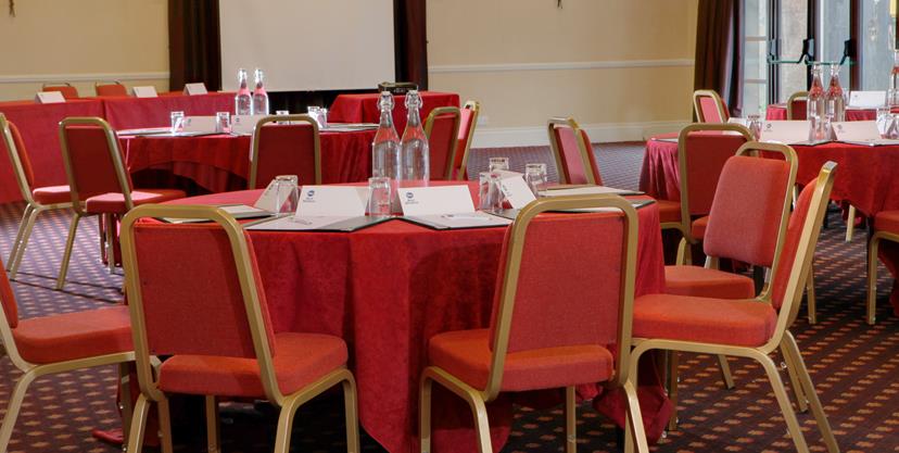 Bristol Suite at The Gables Hotel: round tables for workshops and conferences. - Banner