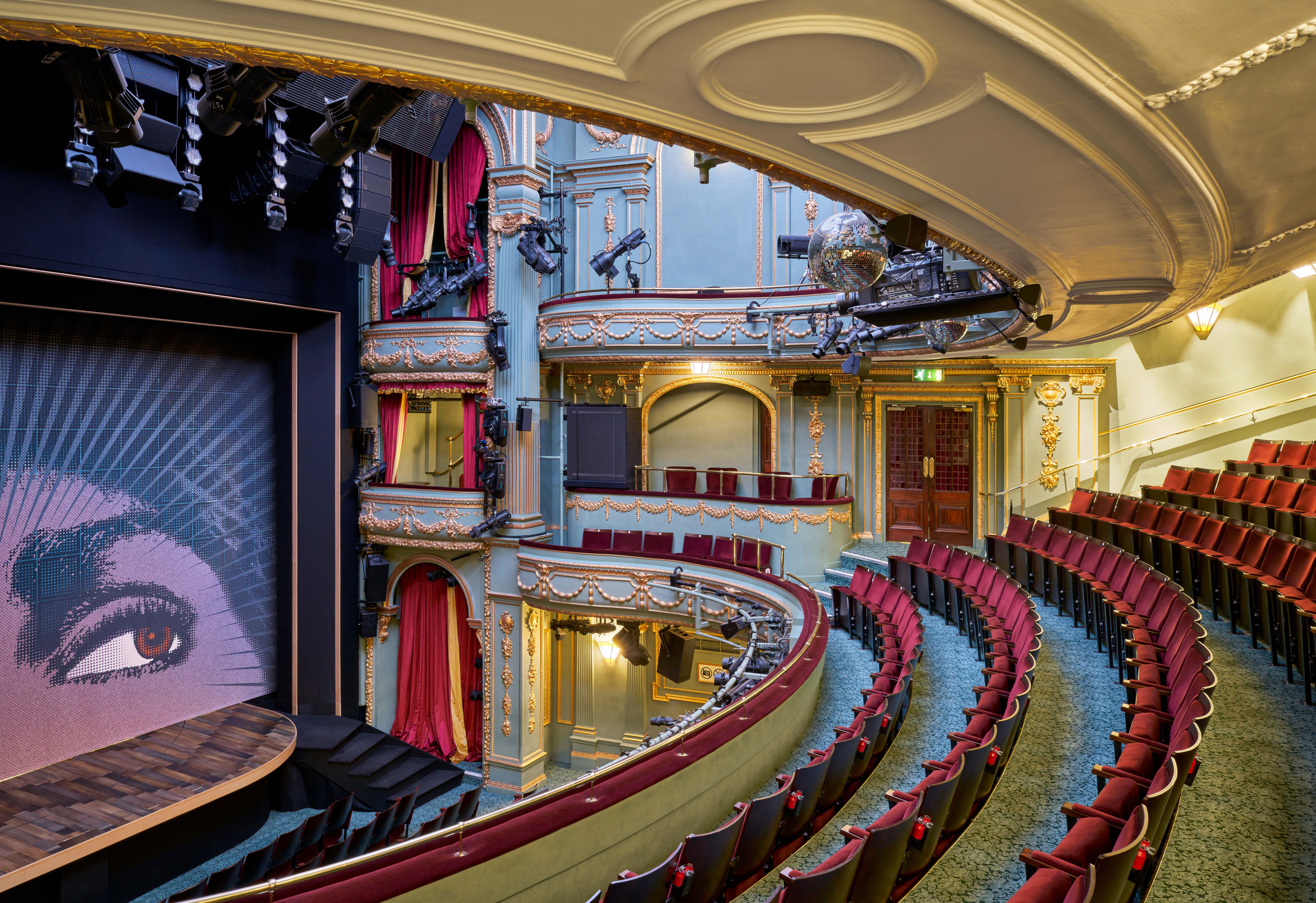 Aldwych Theatre Auditorium with elegant seating, ideal for events and performances. - Banner