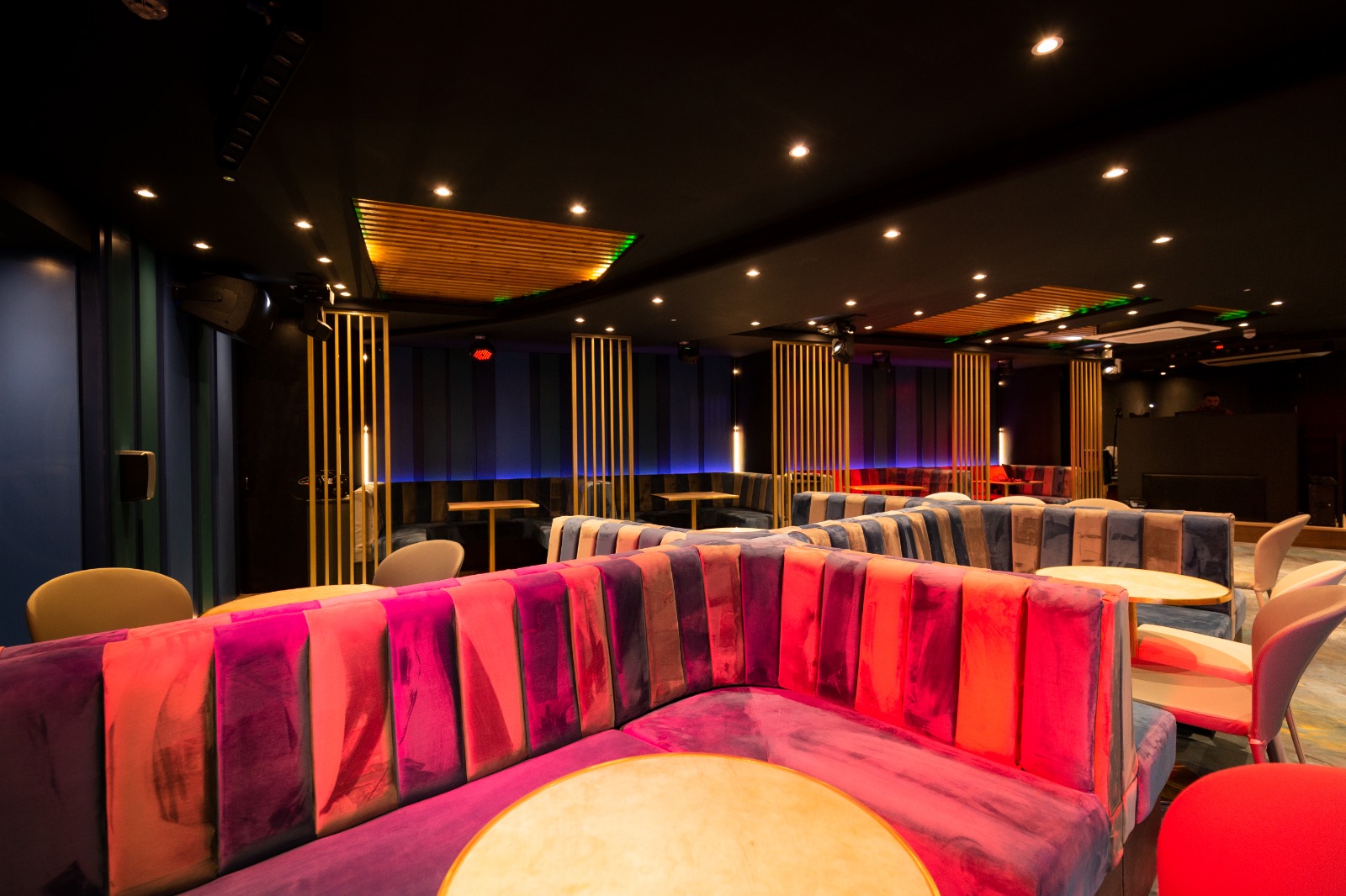 Modern event space in Cococure with vibrant seating for networking and gatherings.