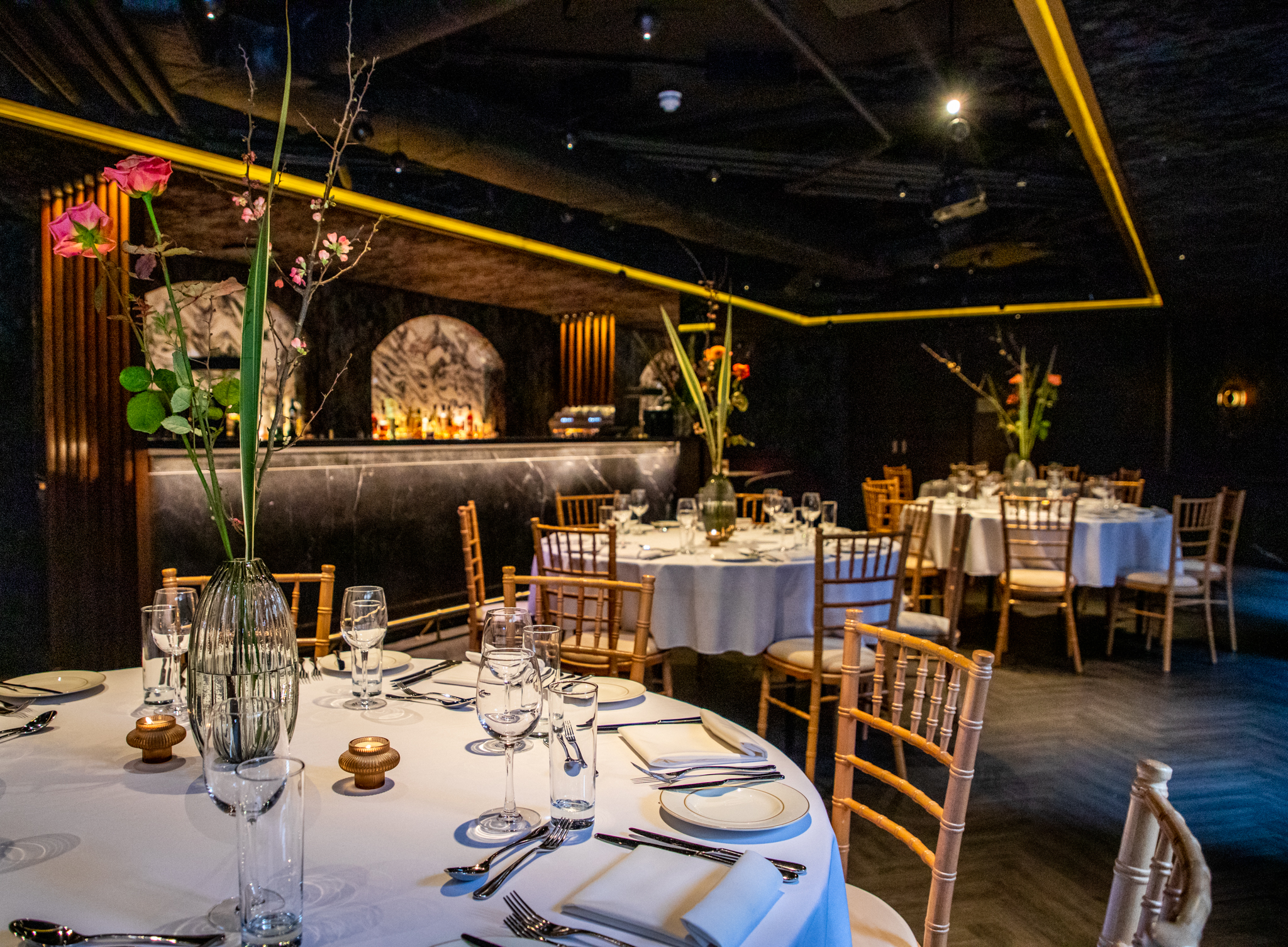 Elegant dining setup at The Bar, 12 Hay Hill for corporate dinners and private events.