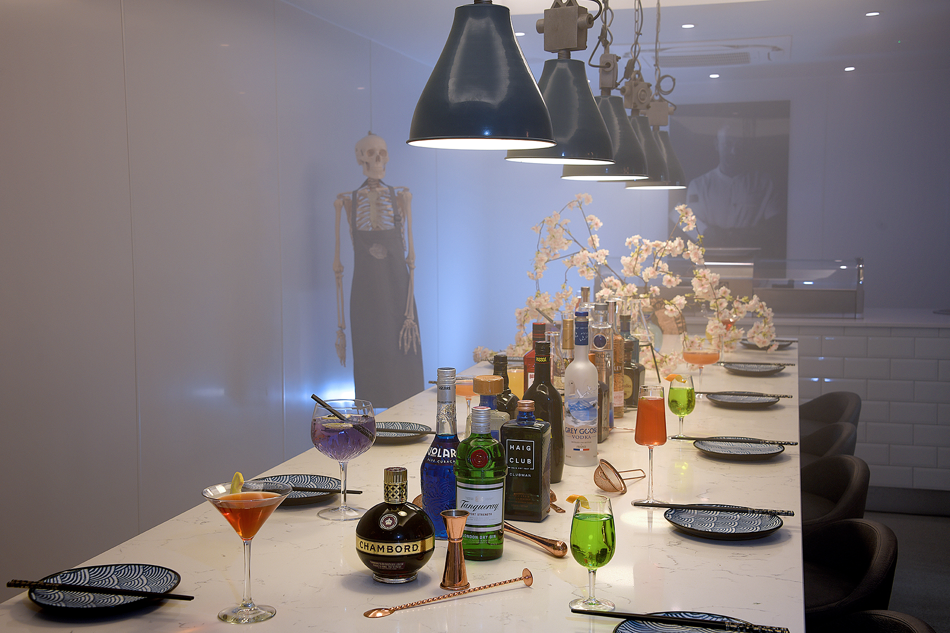 Elegant event space at Lu Ban Bar with cocktails and unique decor for gatherings. - Banner