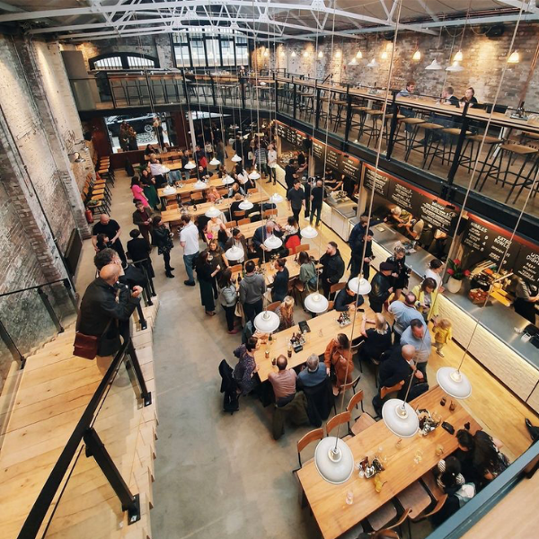 Mezzanine at Duke Street Market: vibrant venue for networking and social events. - Banner