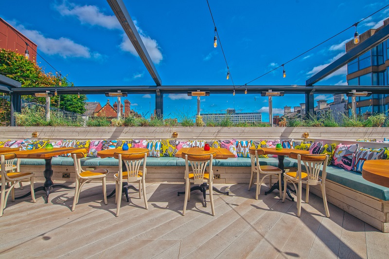 Santiago Sun Terrace outdoor event space with stylish seating for summer parties and networking.