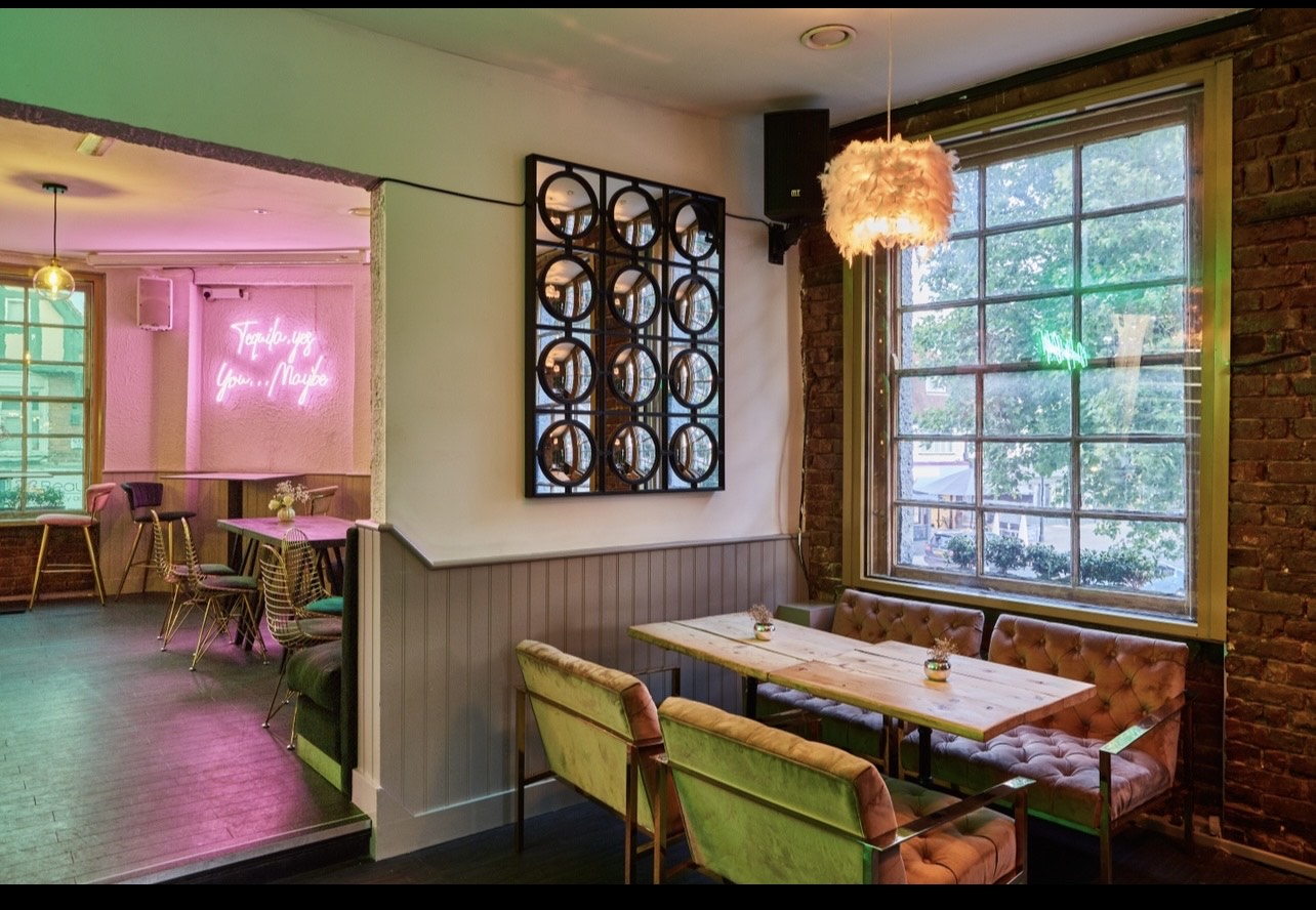 Stylish event space at The Standard Loughton with cozy seating for gatherings and networking. - Banner