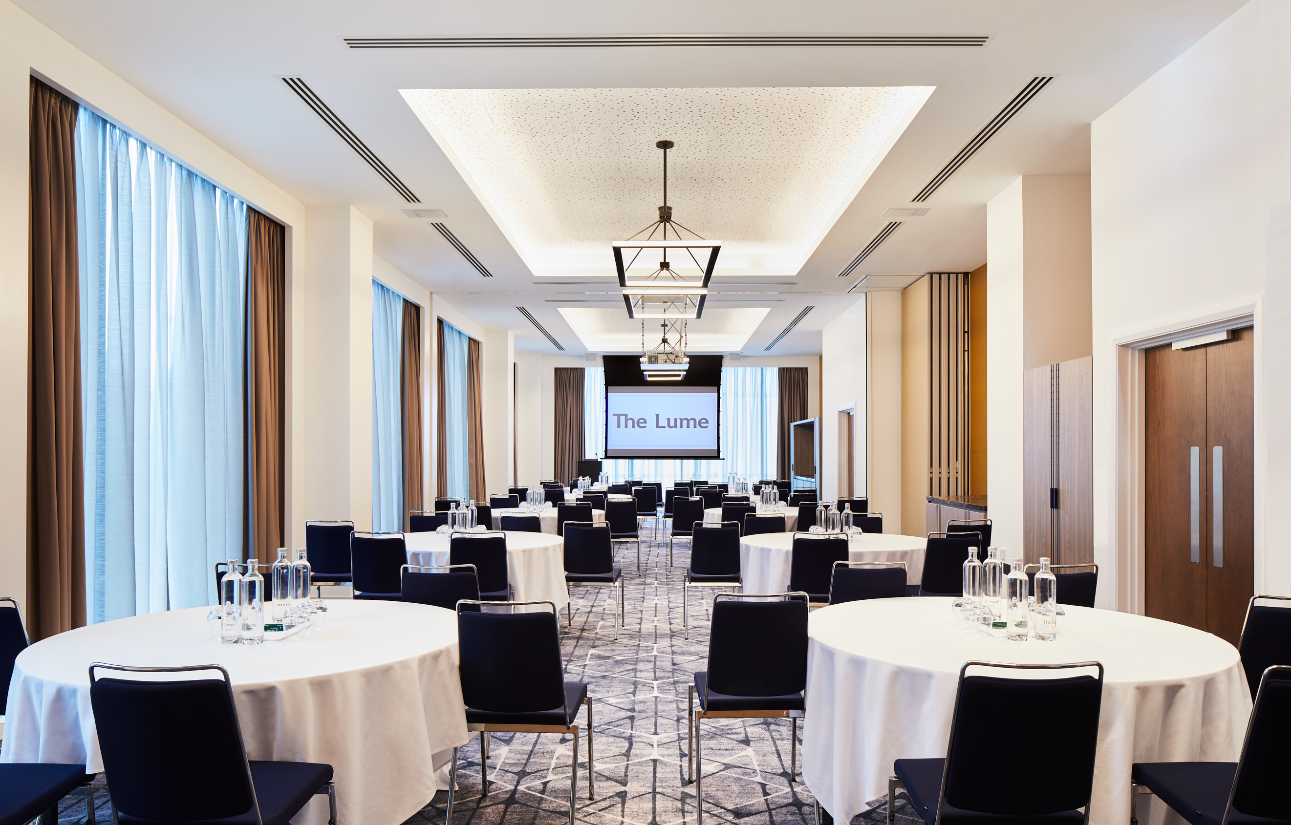 Bernstein Suite at Hyatt Regency Manchester, elegant meeting space with natural light.