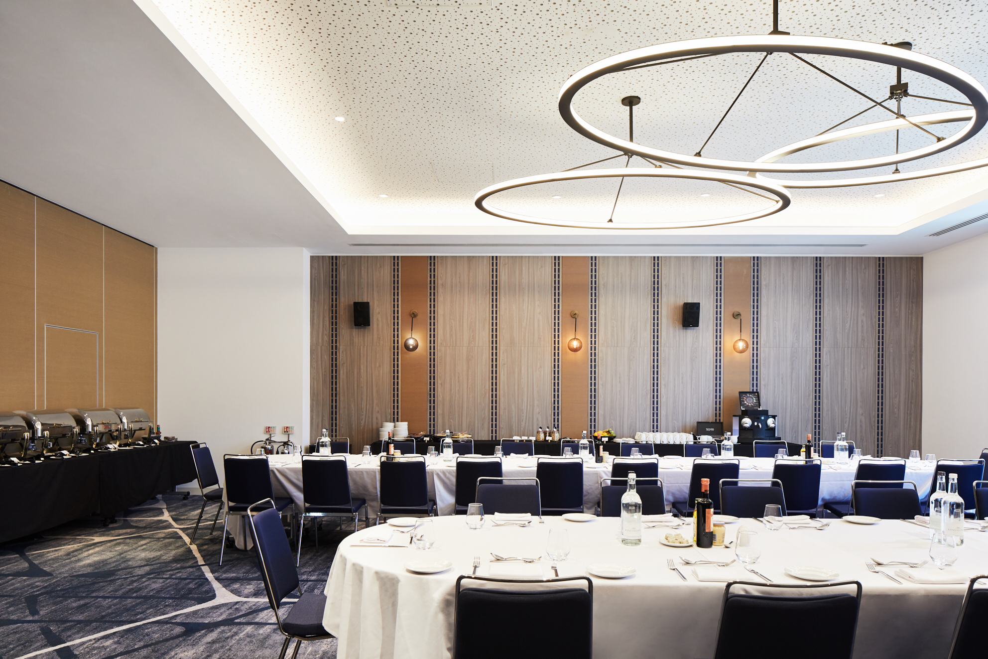 Hyatt Regency Manchester meeting room with elegant round tables for events and catering.