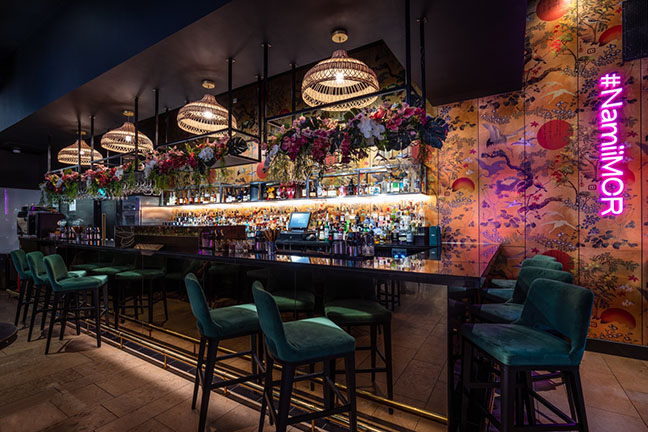 Stylish bar at Namii Kitchen & Cocktails, perfect for networking events and receptions. - Banner