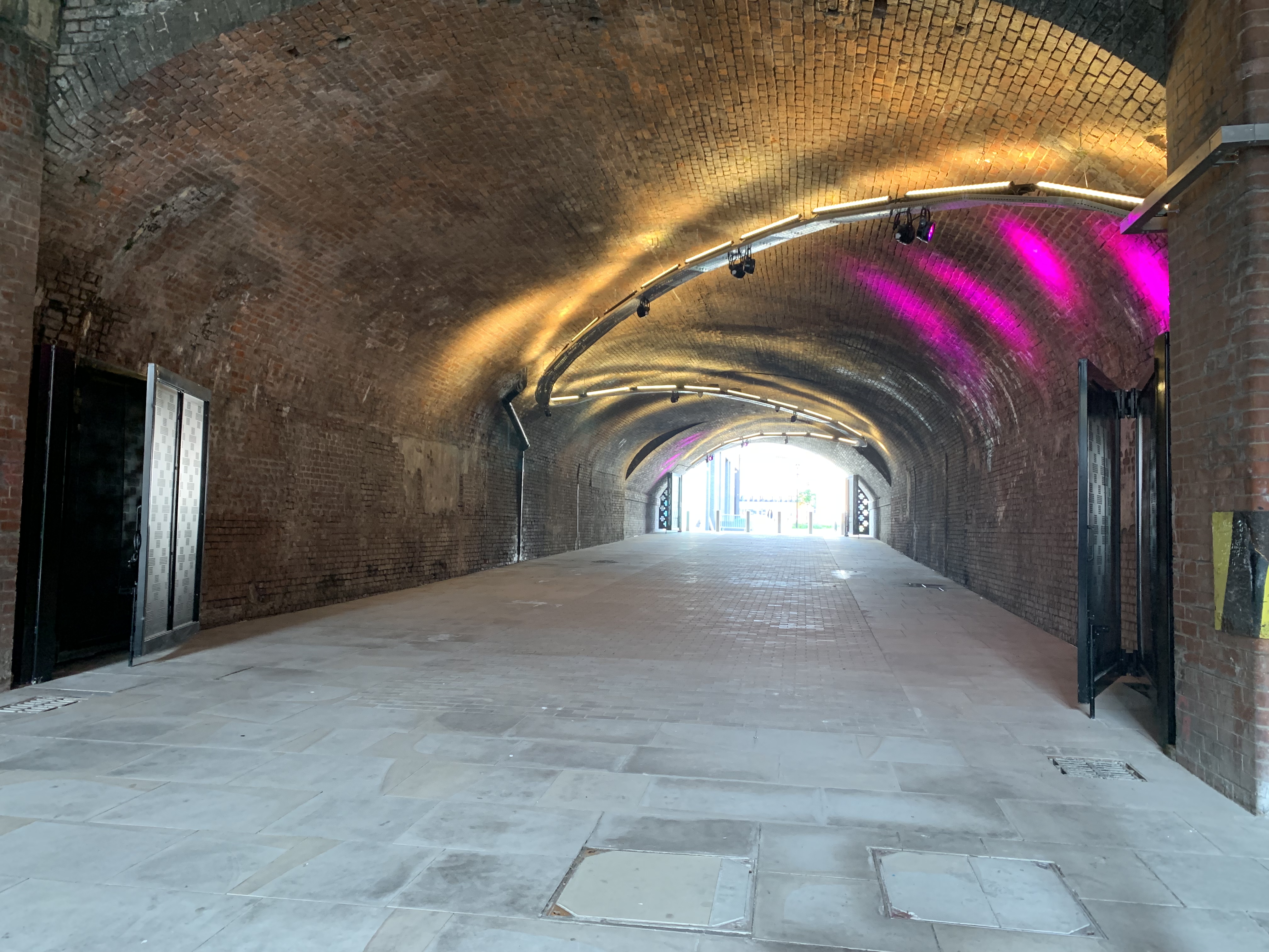The Arch event space with arched brick architecture, perfect for corporate and social events. - Banner