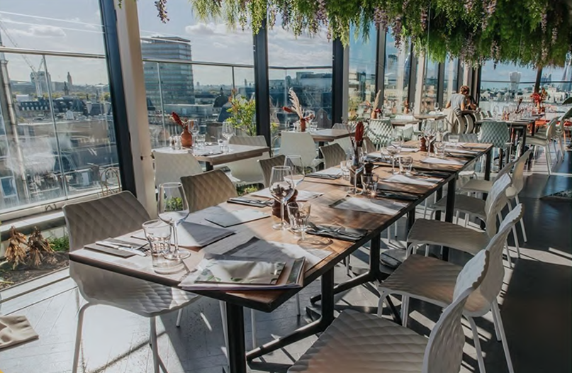 Garden Rooftop venue with elegant dining setup for corporate and social events.