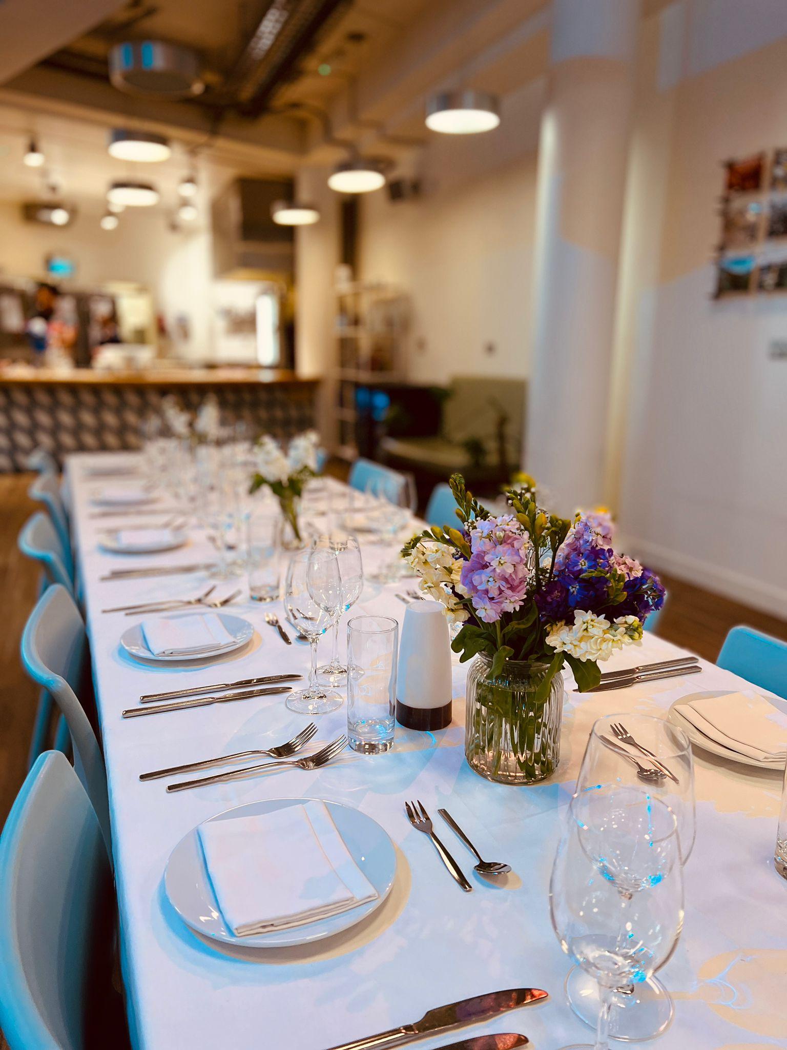 Elegant dining table at Clerkenwell Kitchen for corporate dinner or intimate event. - Banner
