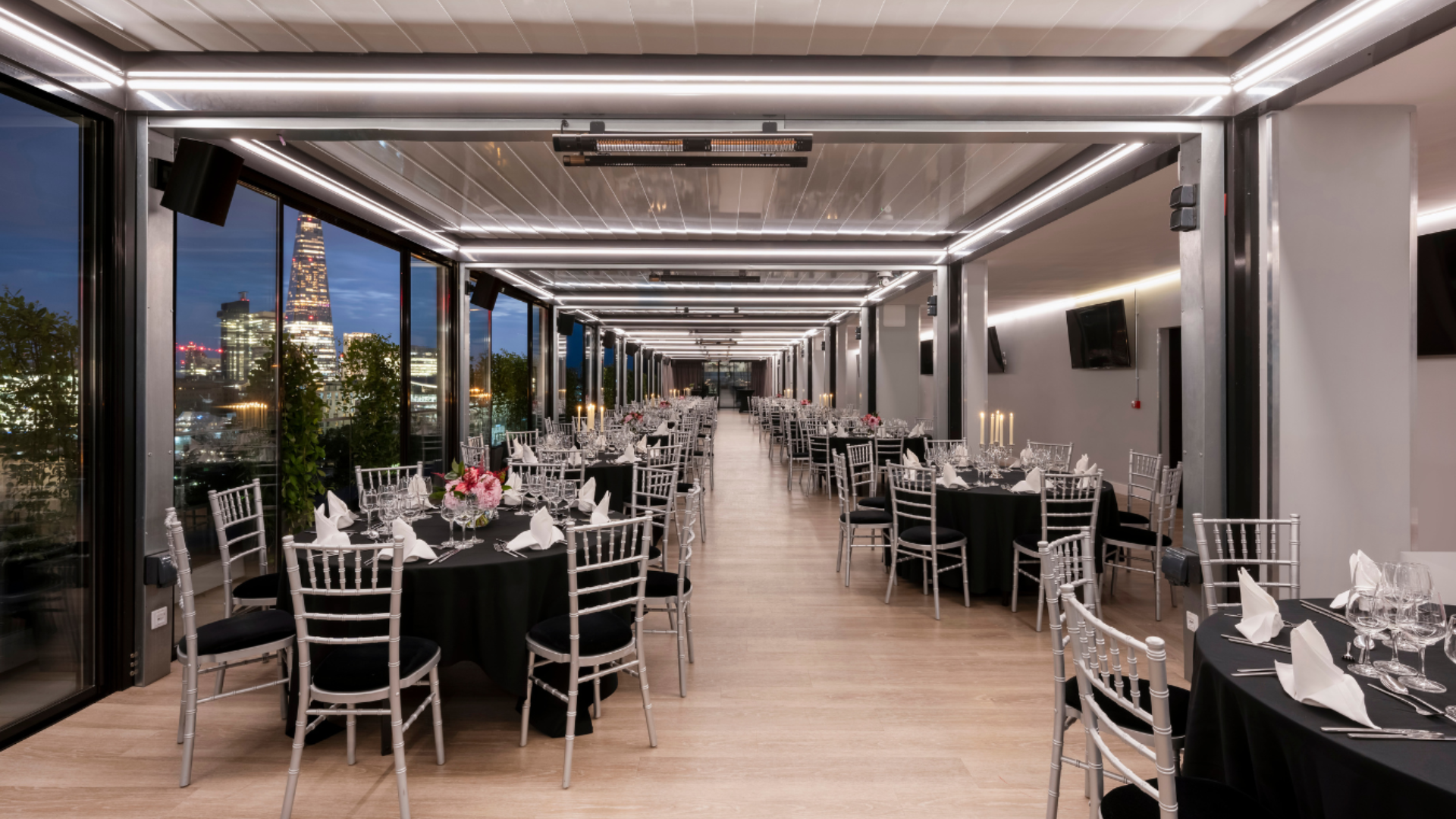 The Skyline London Tower Suites modern exterior night view cityscape hotel event venue