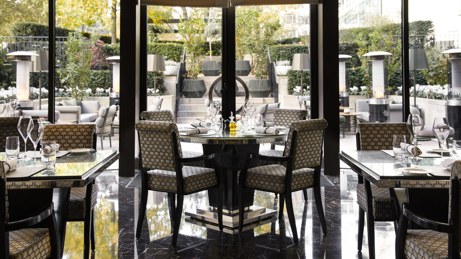Elegant dining space at Four Seasons Hotel London, perfect for upscale events and meetings. - Banner