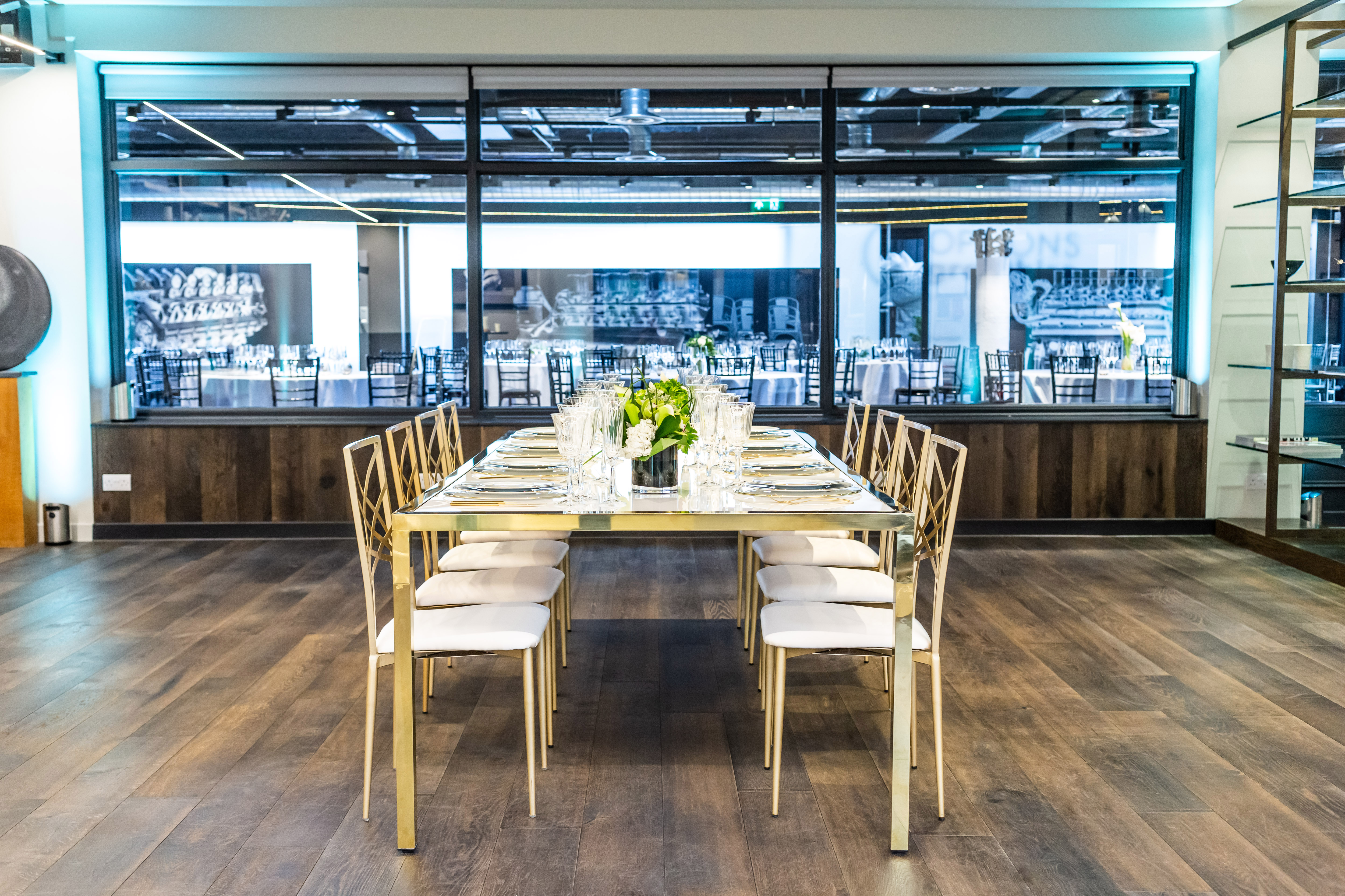 Modern meeting space with sleek table, ideal for corporate events and private dinners.