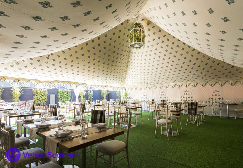 Elegant marquee in Babur, perfect for weddings and corporate events with lush greenery. - Banner