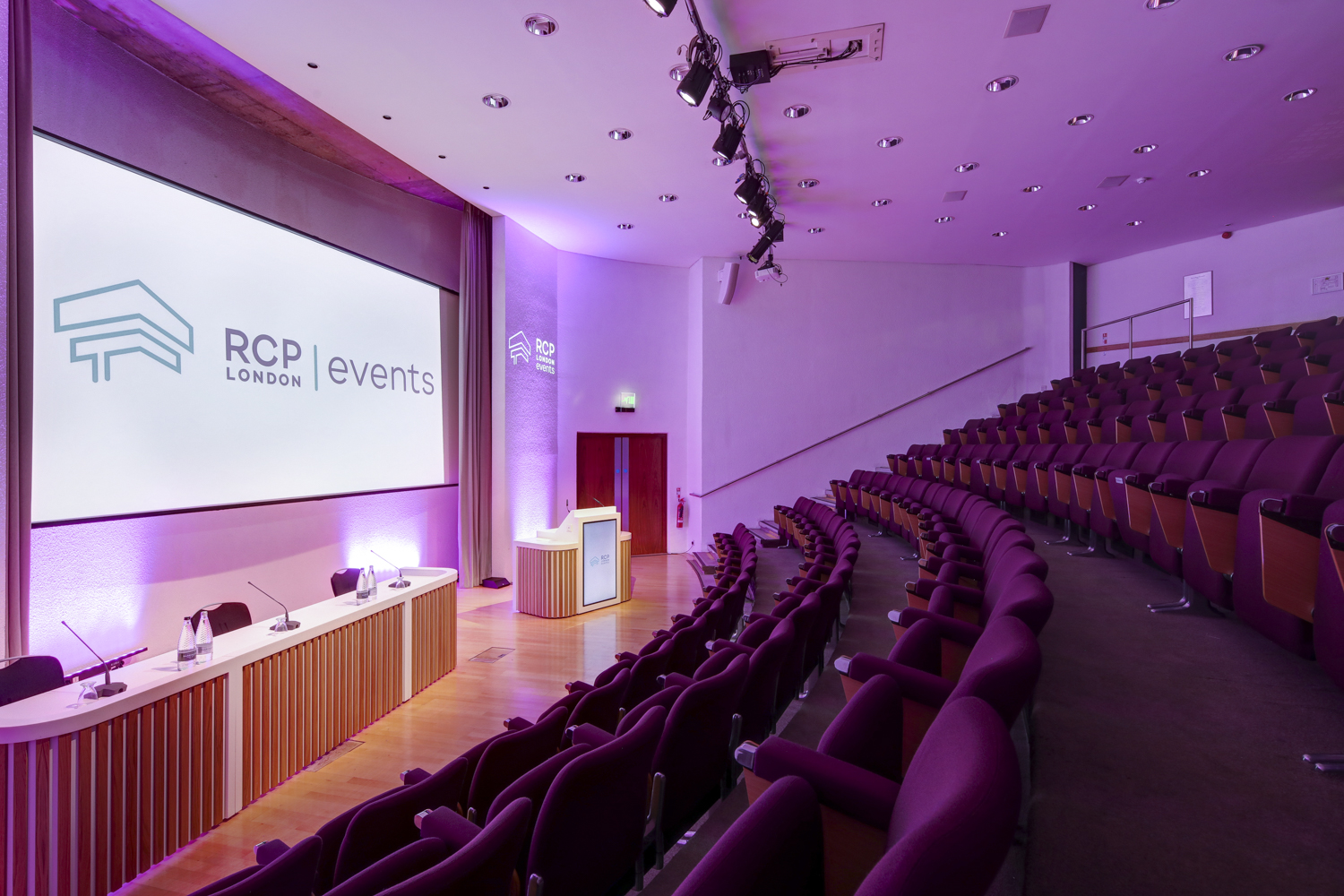 Seligman Theatre at RCP London, modern auditorium with tiered seating for events. - Banner