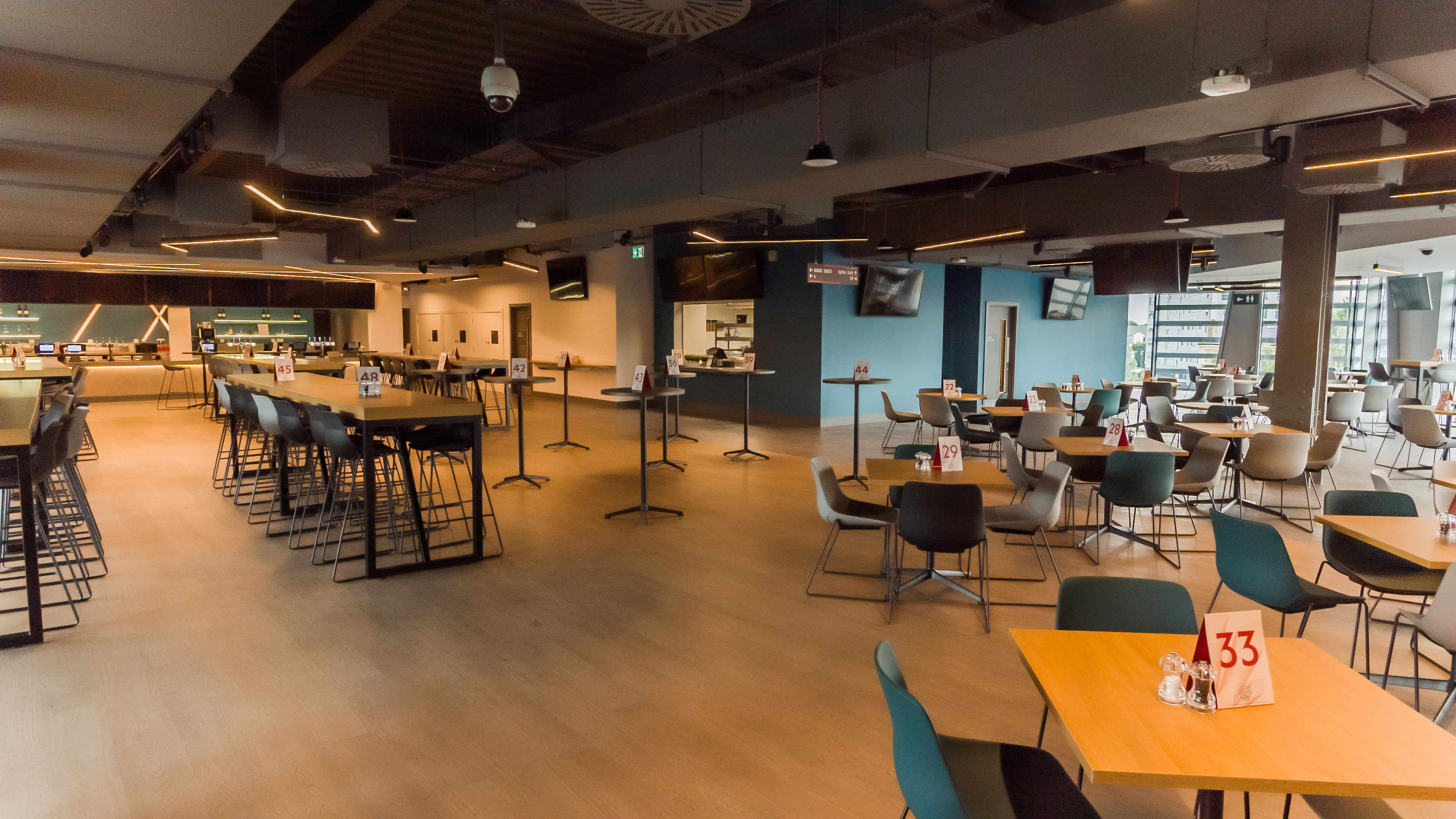 Legends Suite at Brentford FC: modern event venue with flexible seating for networking. - Banner