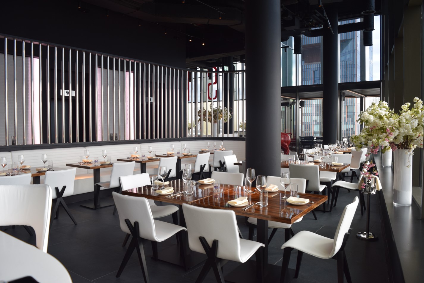 Modern Bistro at STK Rooftop Stratford, elegant design for upscale events and meetings.