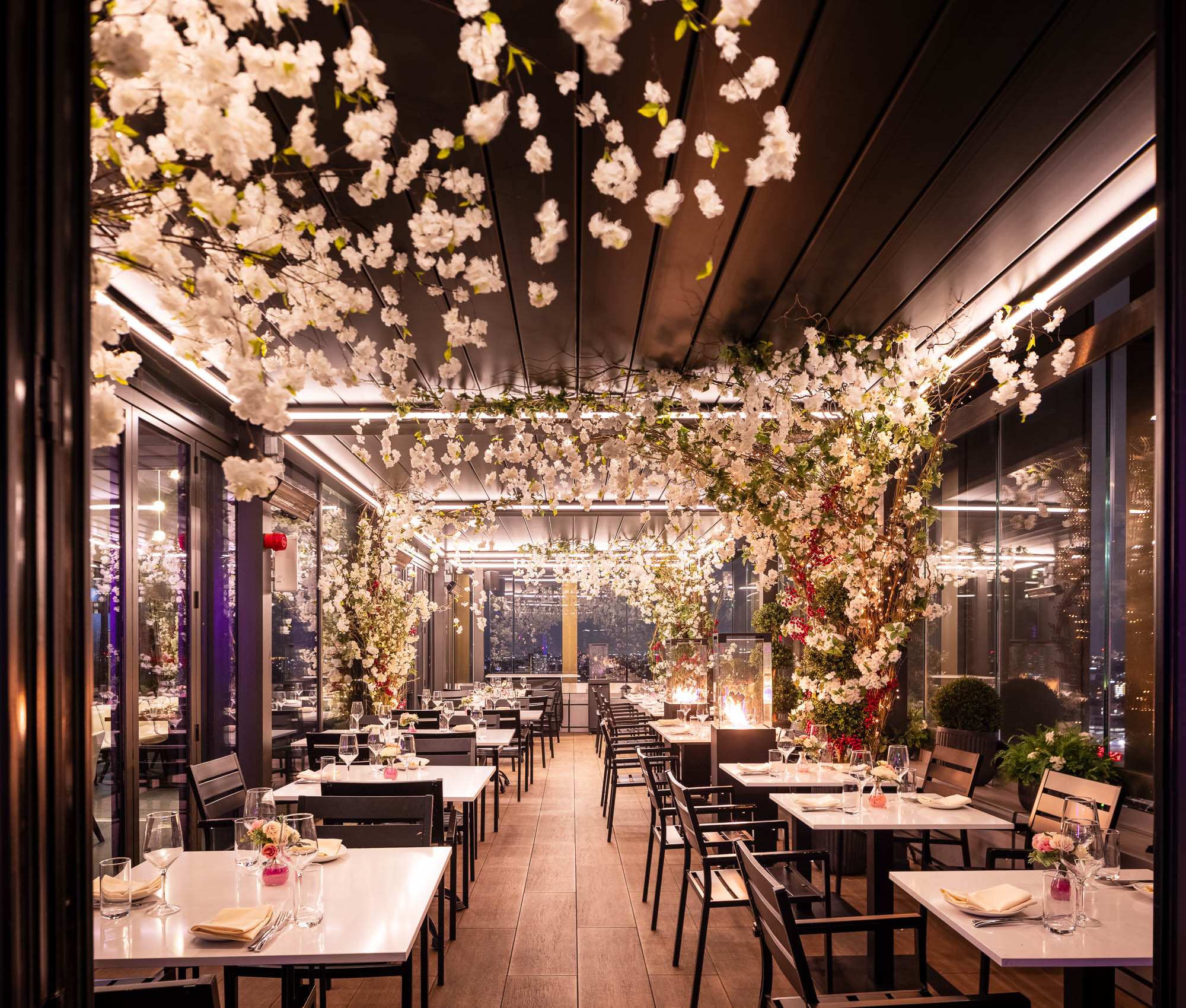 Elegant floral decor in STK Rooftop's East Terrace, perfect for weddings and corporate events.