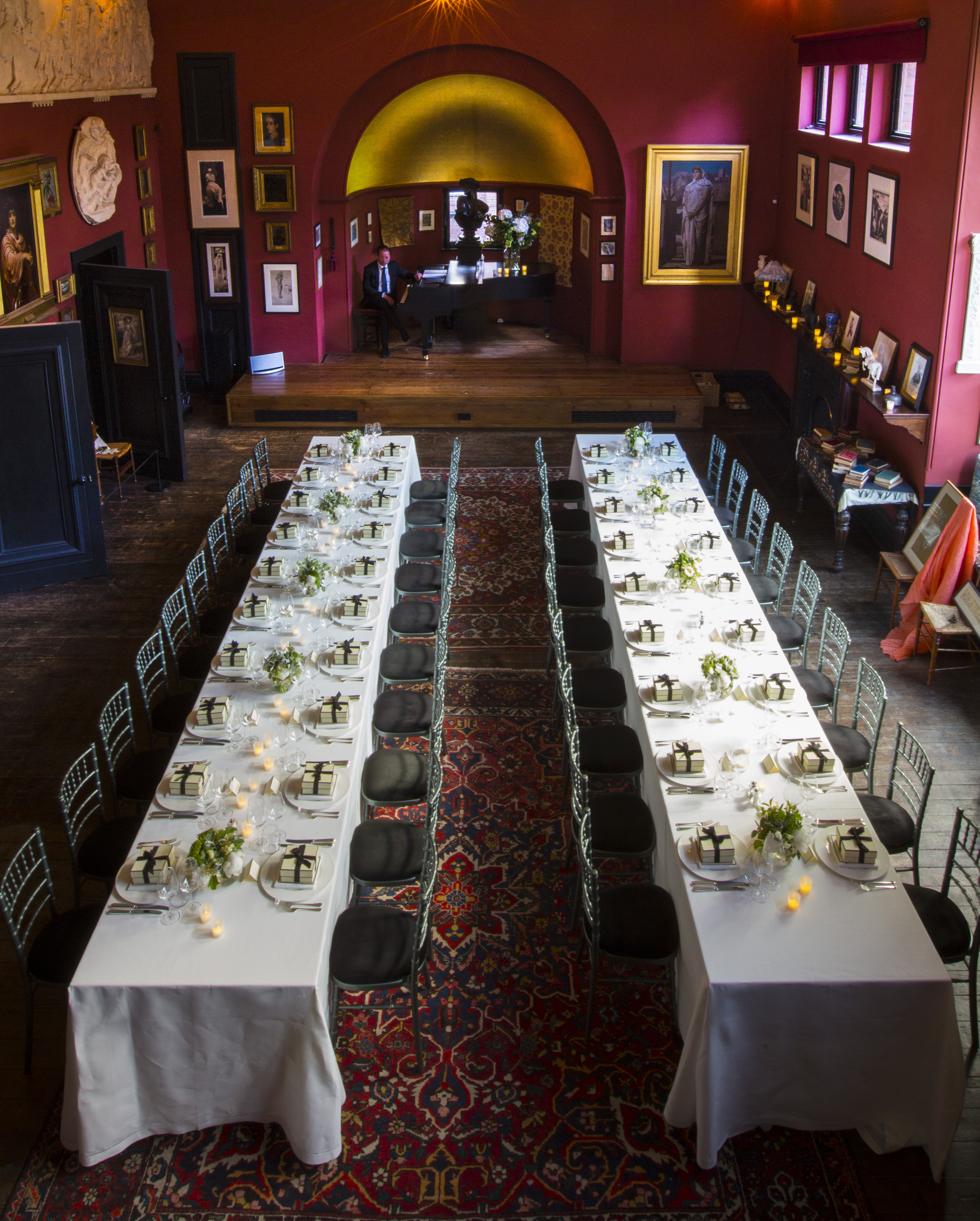 Elegant event space at Leighton House with a long table, perfect for gatherings.
