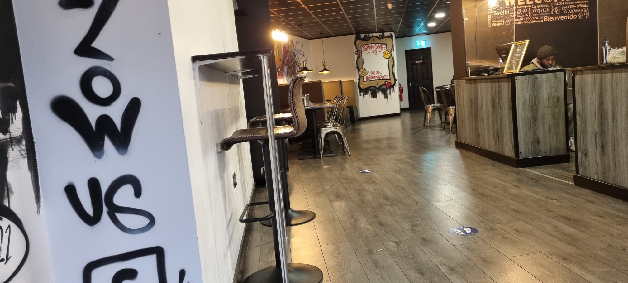 Modern event space with casual seating, ideal for networking and gatherings. - Banner