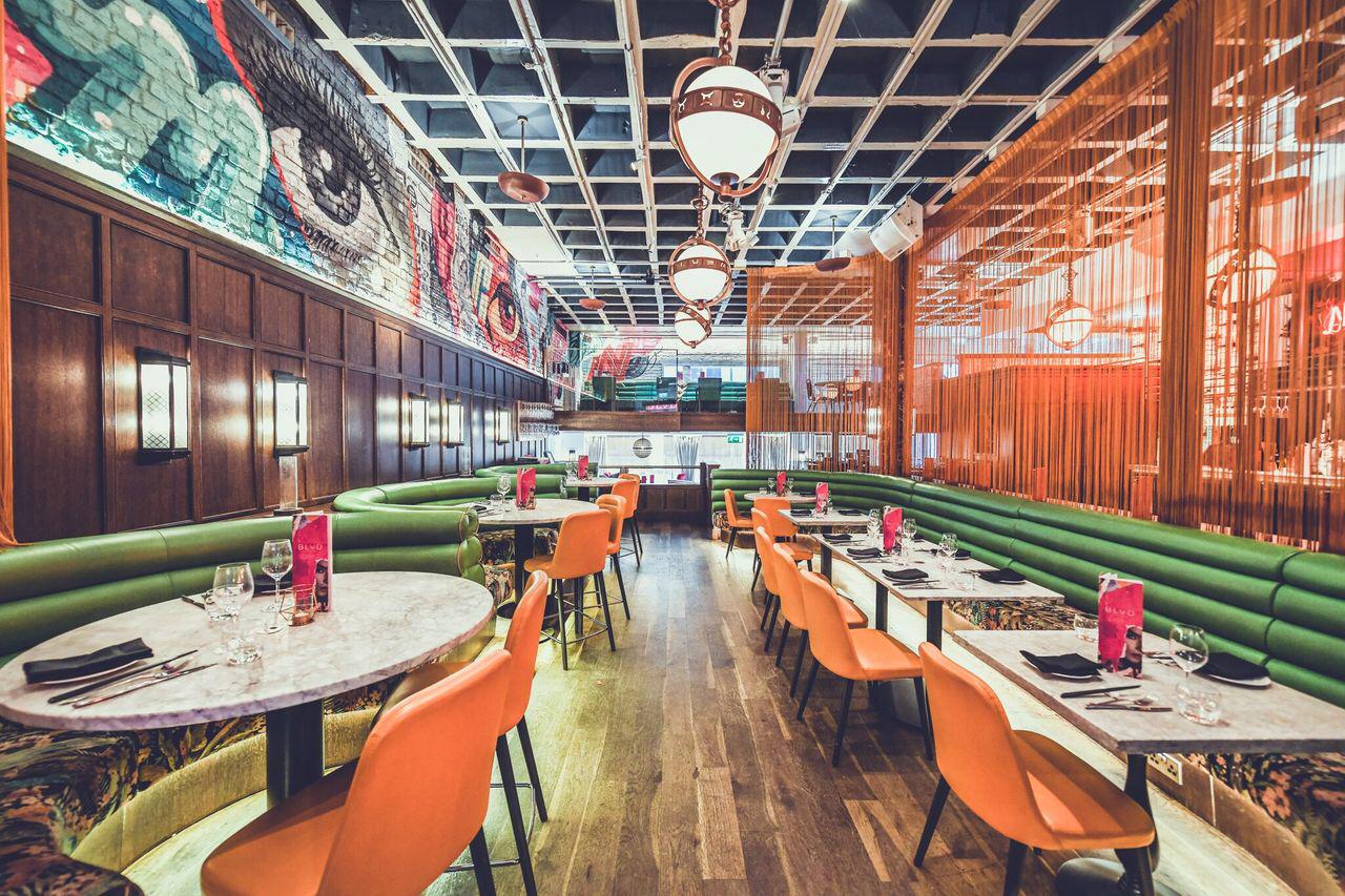 Vibrant BLVD Spinningfields restaurant with modern decor for gatherings and meetings.