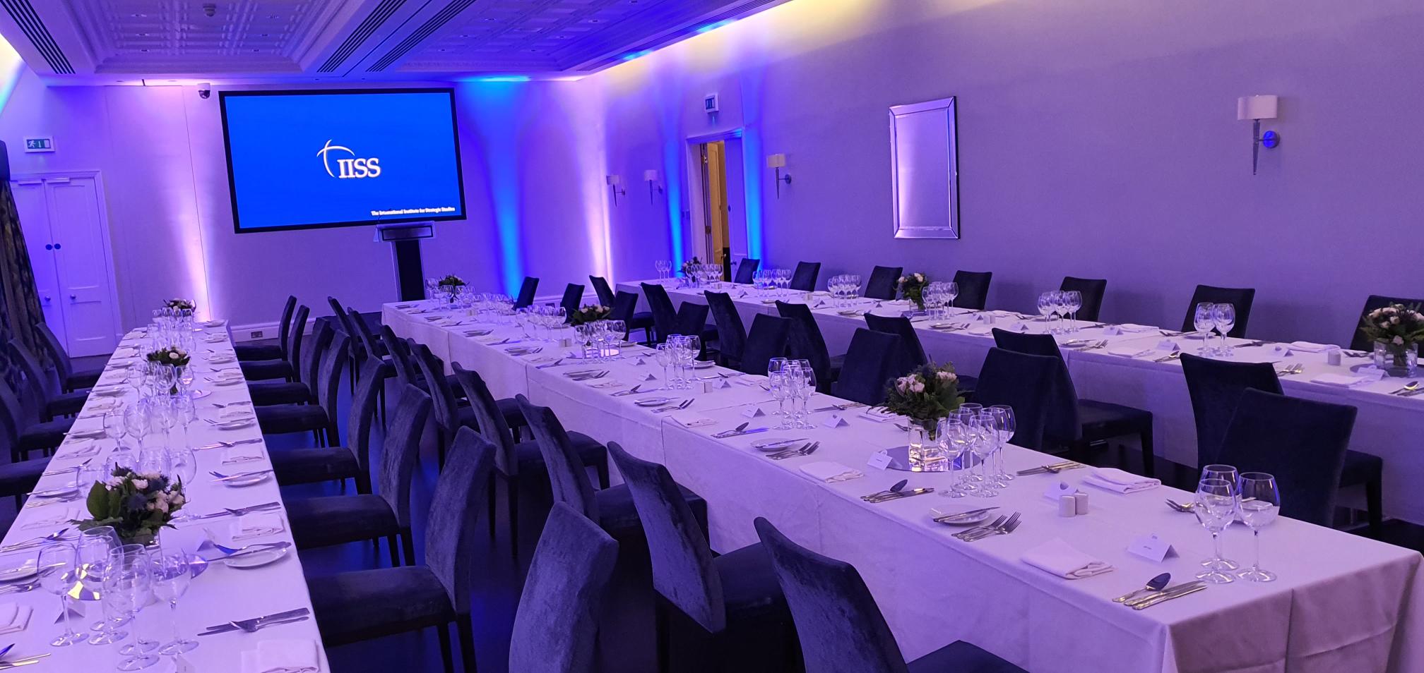 Lee Kuan Yew Room boardroom with purple lighting for corporate meetings and professional events.