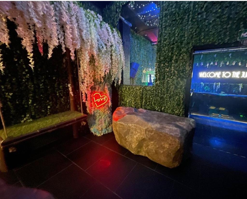 Lush event space at Jungle Bar & Grill, perfect for themed gatherings and social events. - Banner