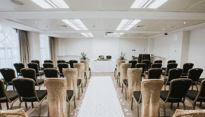 Elegant event space at Radisson Blu Leeds, ready for a formal ceremony.