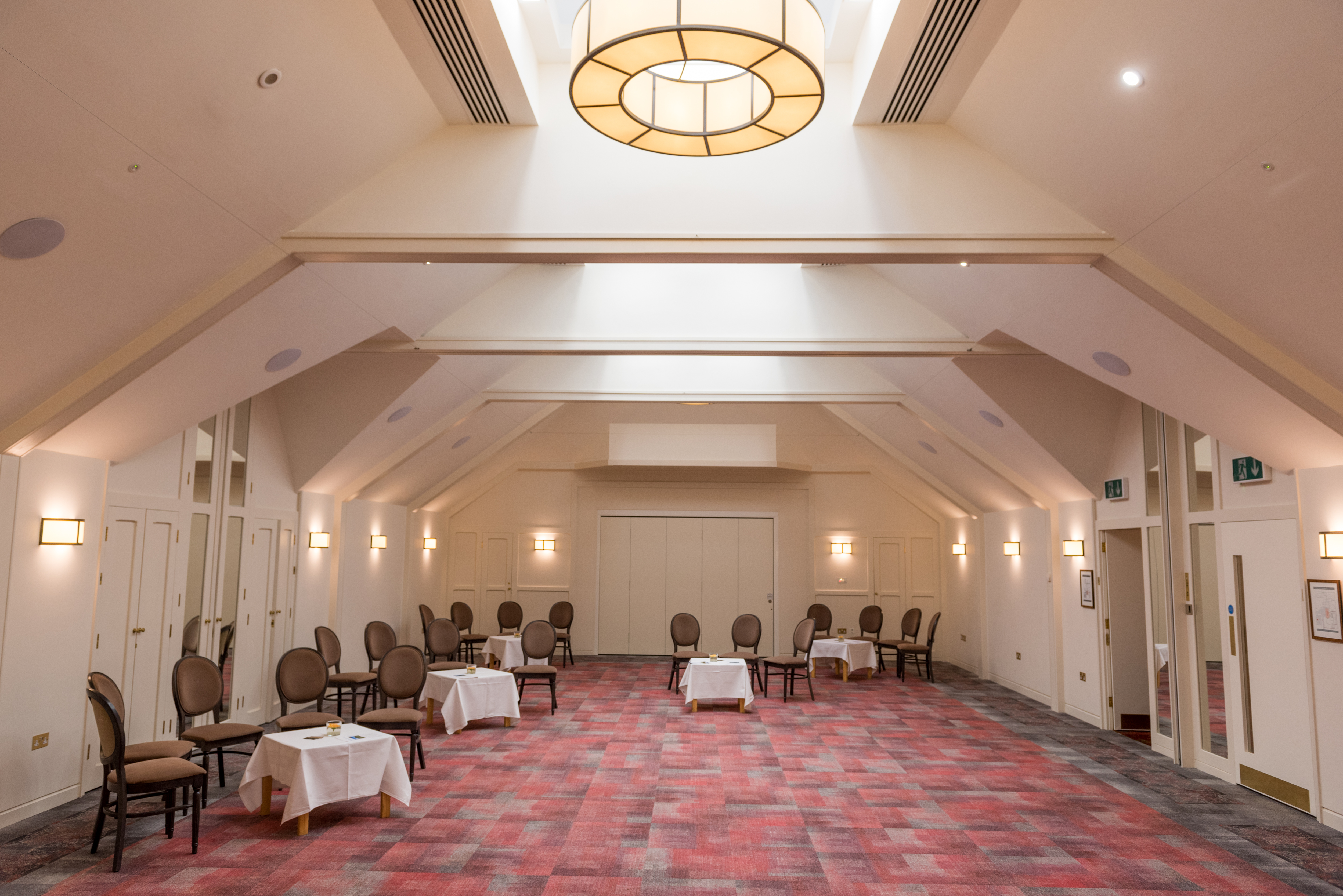 Spacious London Room at Warren House Hotel, ideal for meetings and presentations.