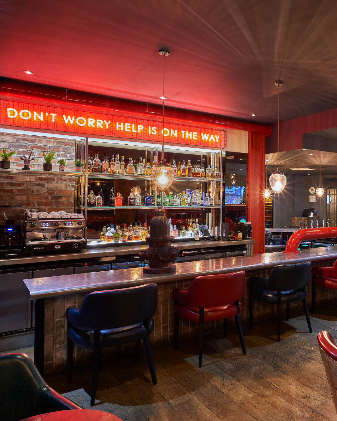 Stylish bar area in Work and Play Suite, perfect for networking events in Manchester.