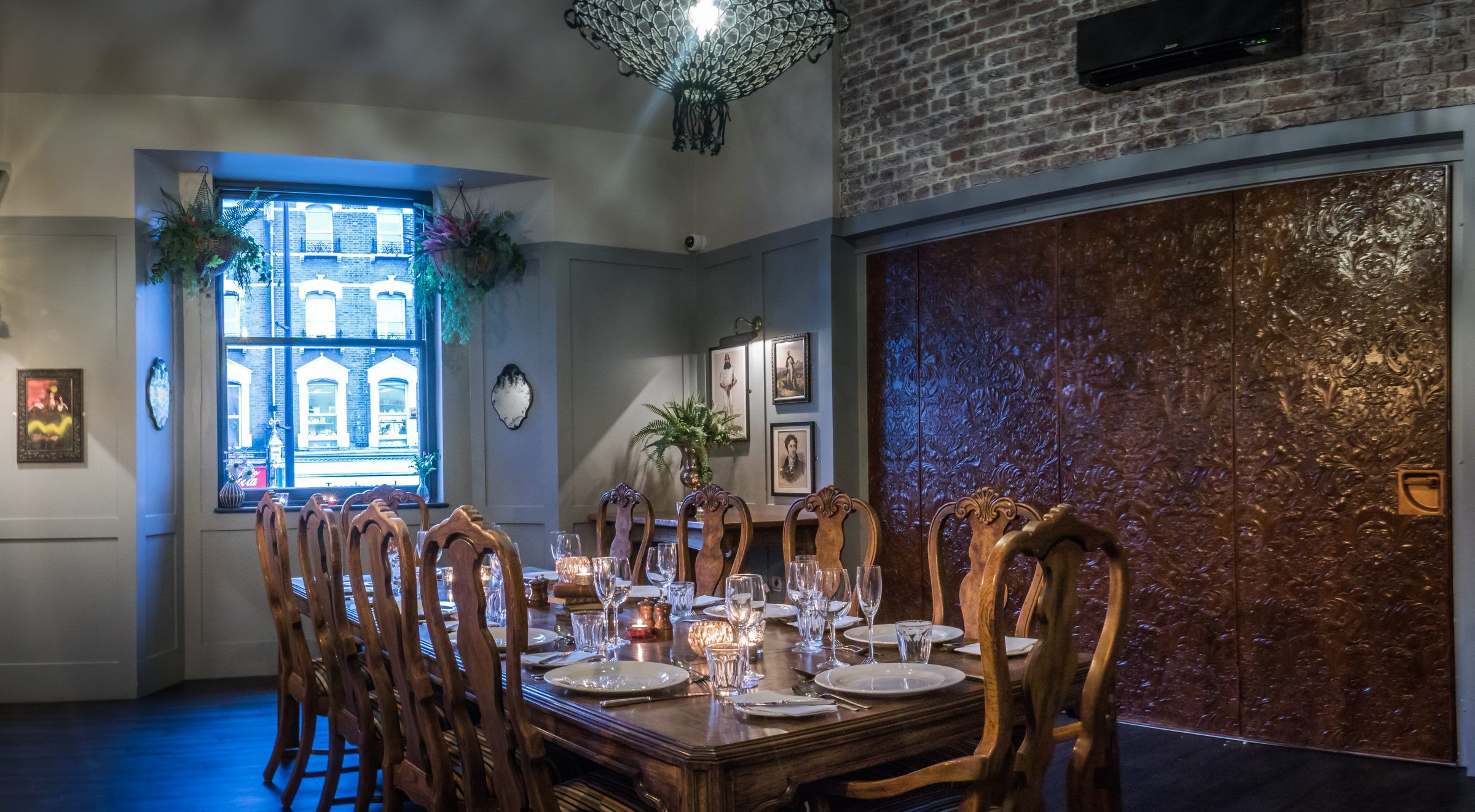 Elegant private dining room with rustic decor for events and meetings.