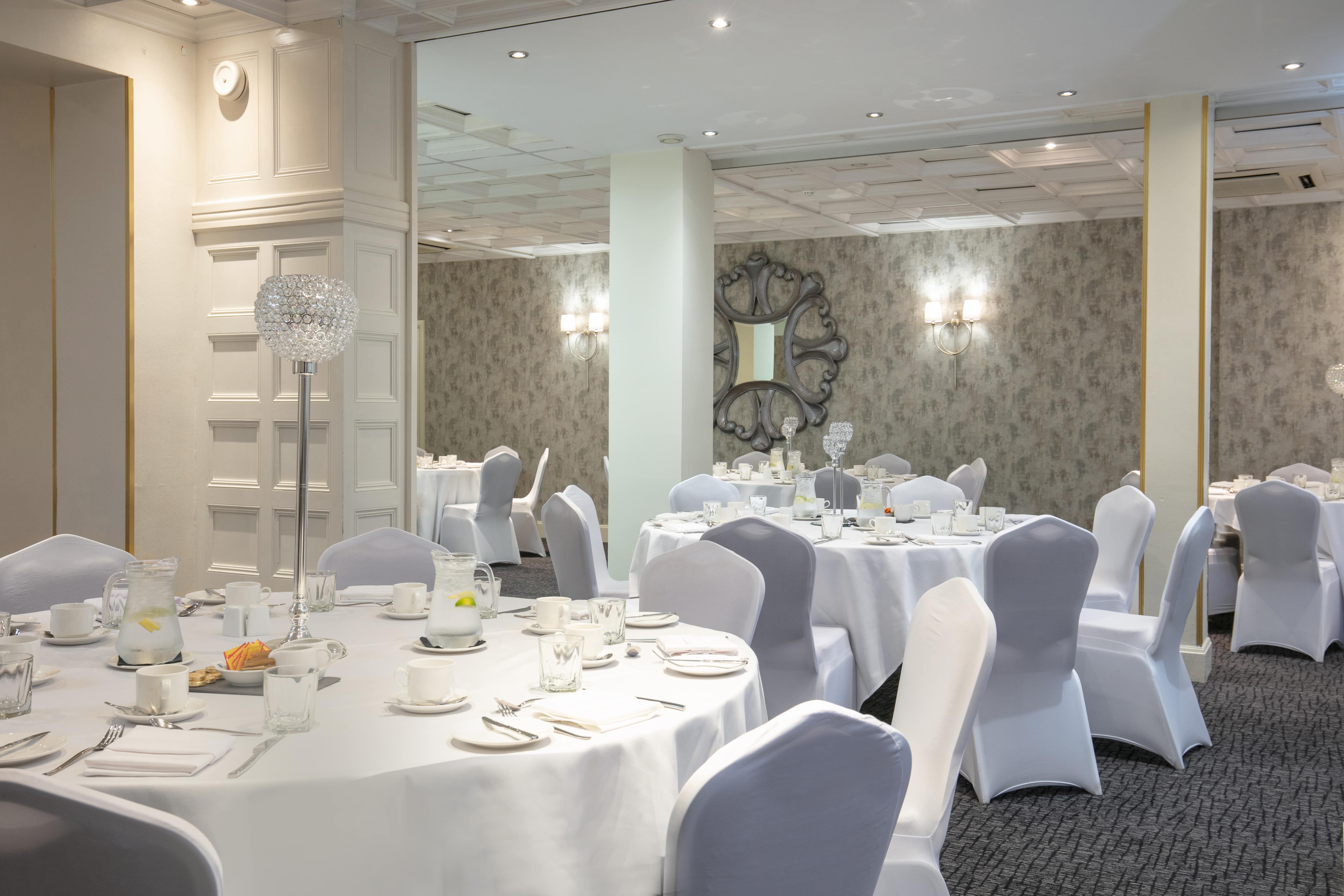 Elegant Manor room at Barton Manor Hotel, perfect for corporate events and formal gatherings. - Banner