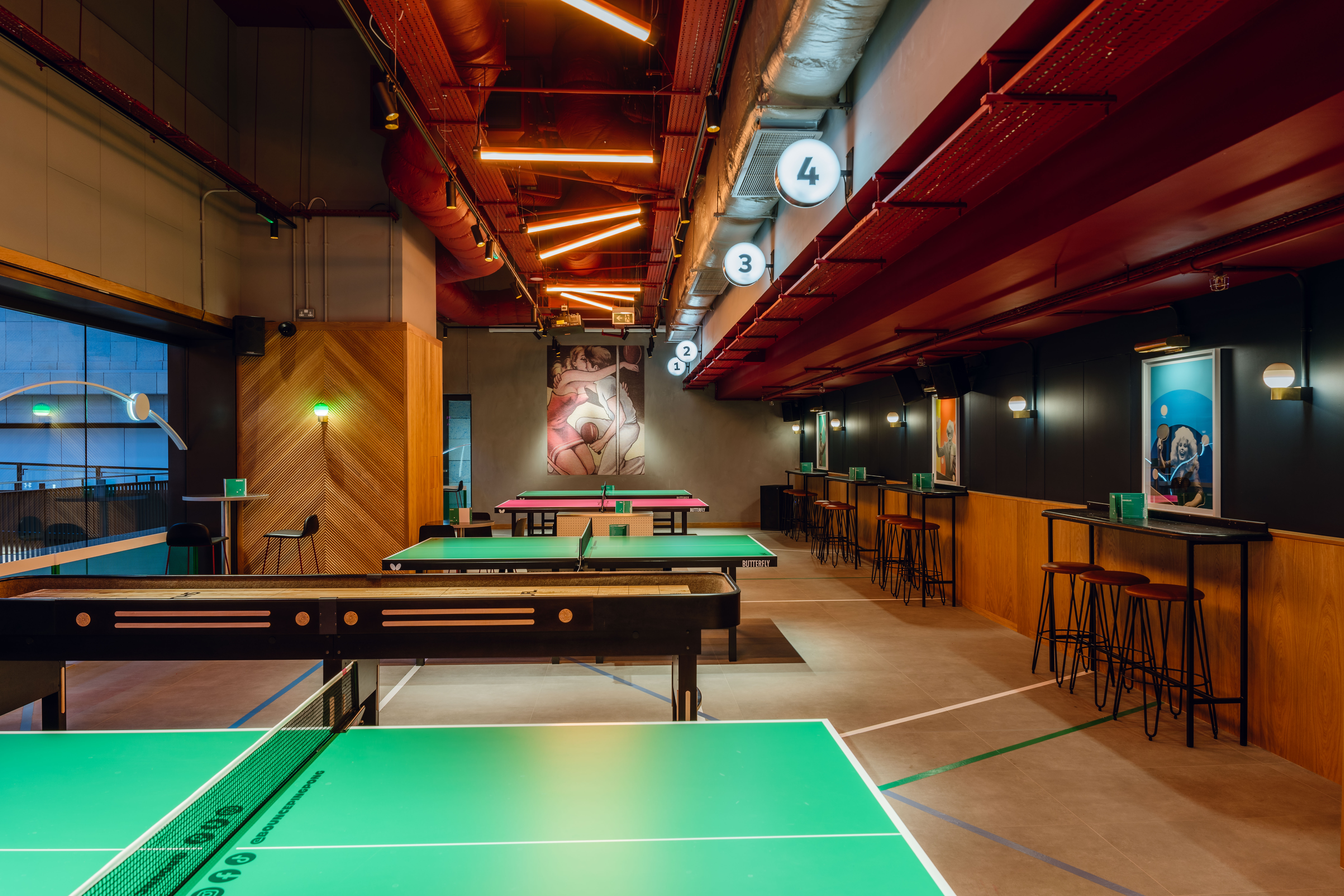 Exclusive venue hire at Bounce Battersea with ping pong tables for corporate events. - Banner