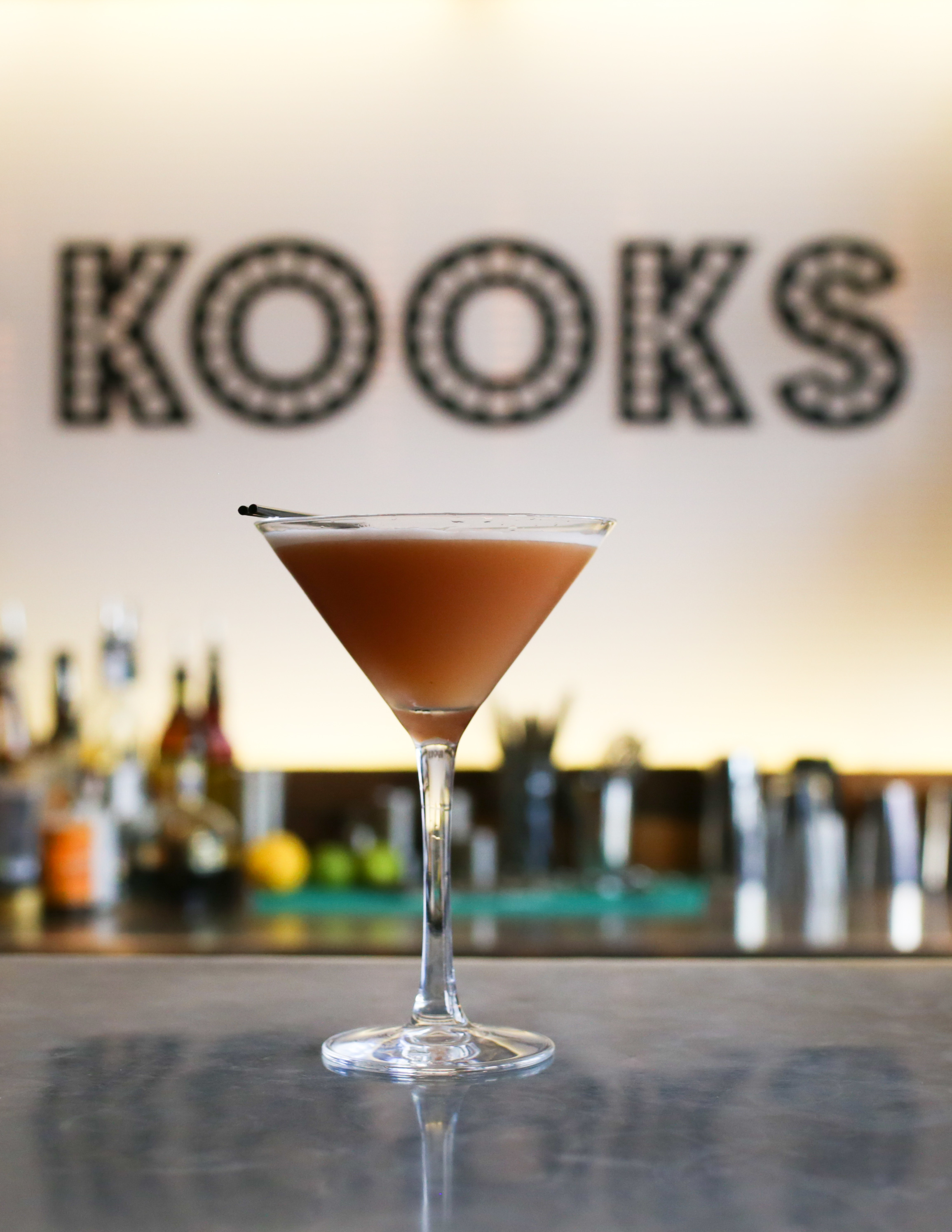 Stylish cocktail at Kooks Restaurant, perfect for networking events and celebrations. - Banner