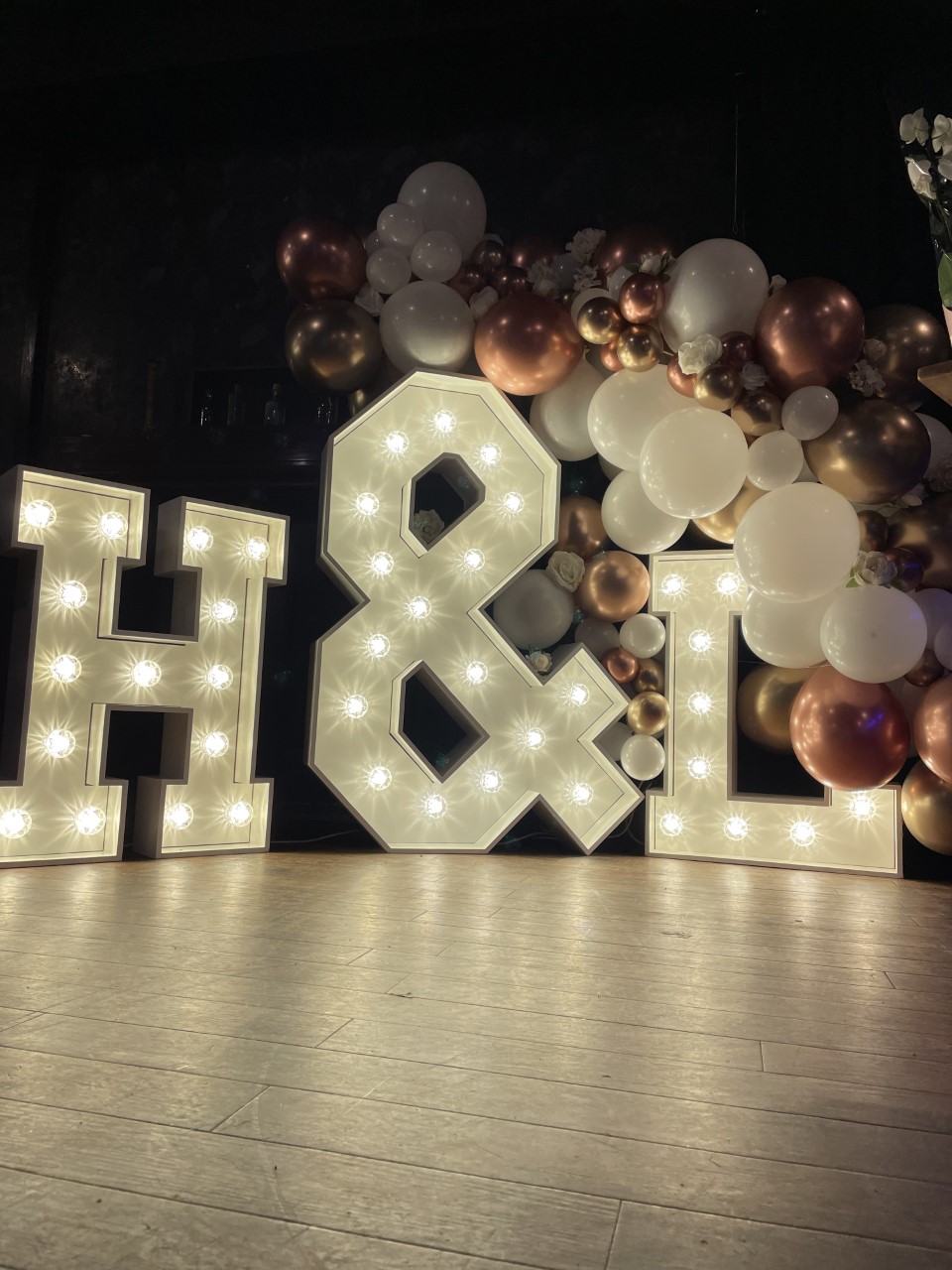 Illuminated "H & L" marquee at The Fitzgerald, perfect for weddings and celebrations. - Banner