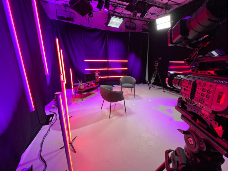 Modern Great West Studio with neon lighting for virtual events and hybrid meetings. - Banner