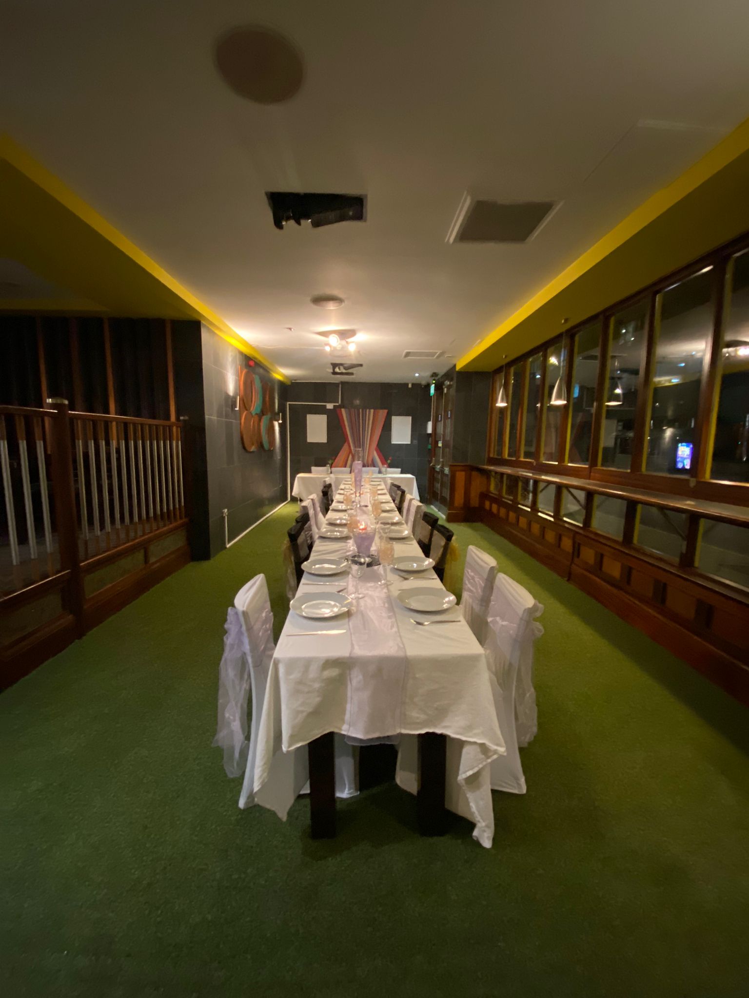 Private dining setup with elegant table for intimate gatherings and corporate events. - Banner