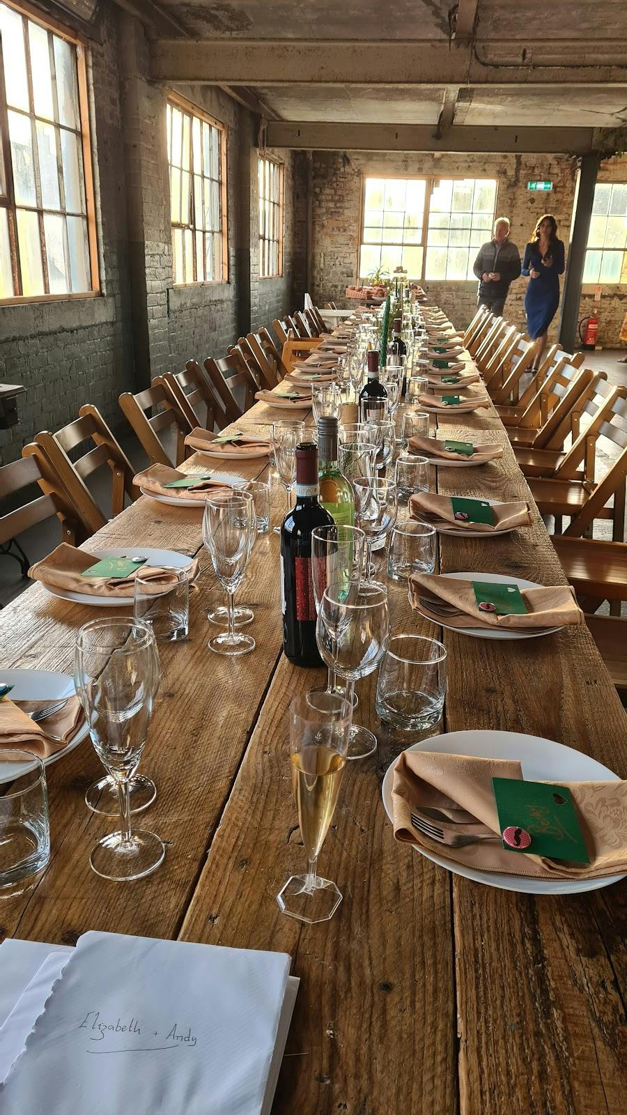 Elegant dining table setup at The Biscuit Factory for a sophisticated event.