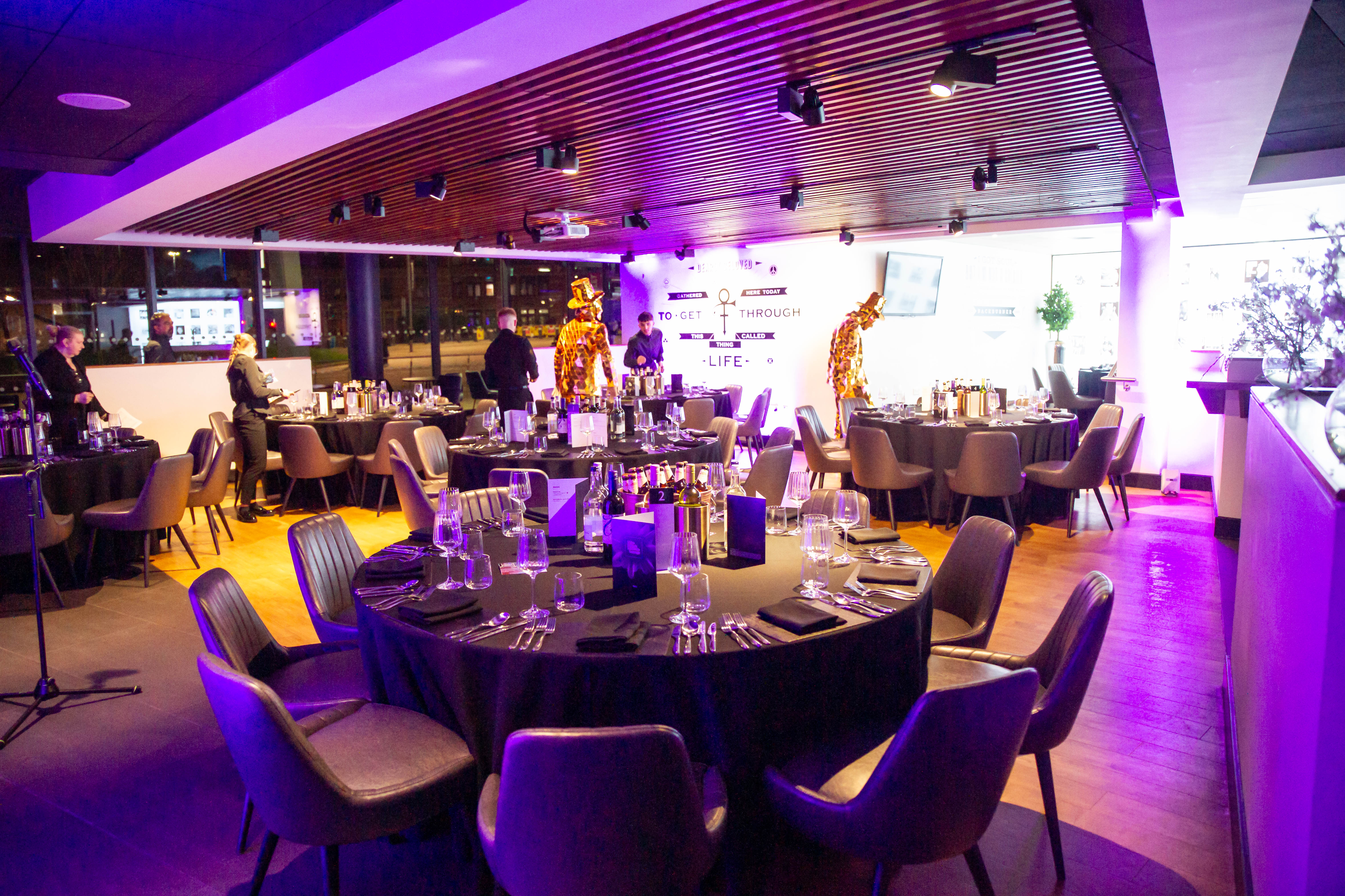 Black and White Lounge in Leeds, elegant dinner setup for corporate events. - Banner