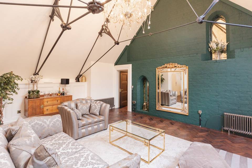 Elegant Bridal Suite with plush seating, perfect for intimate gatherings or meetings.