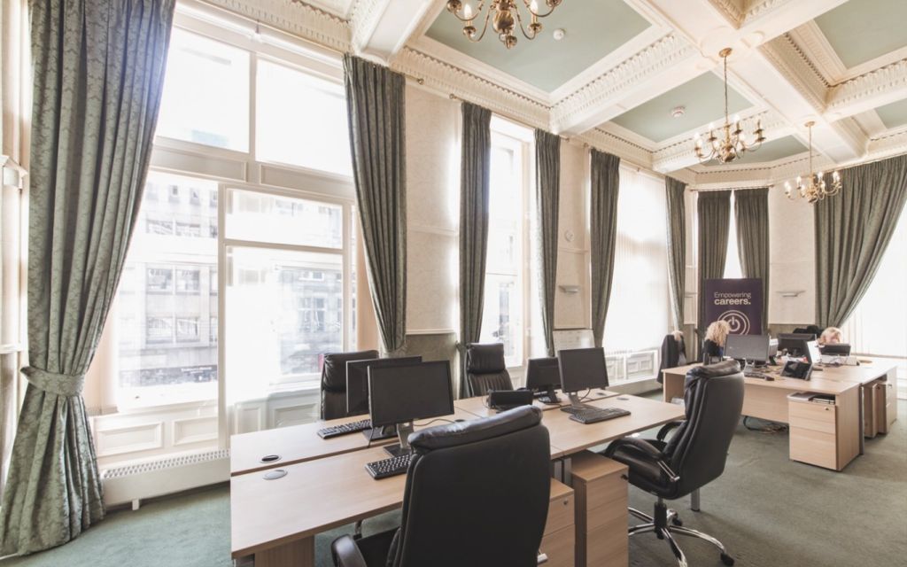 Elegant meeting room with large windows in serviced offices for corporate events. - Banner